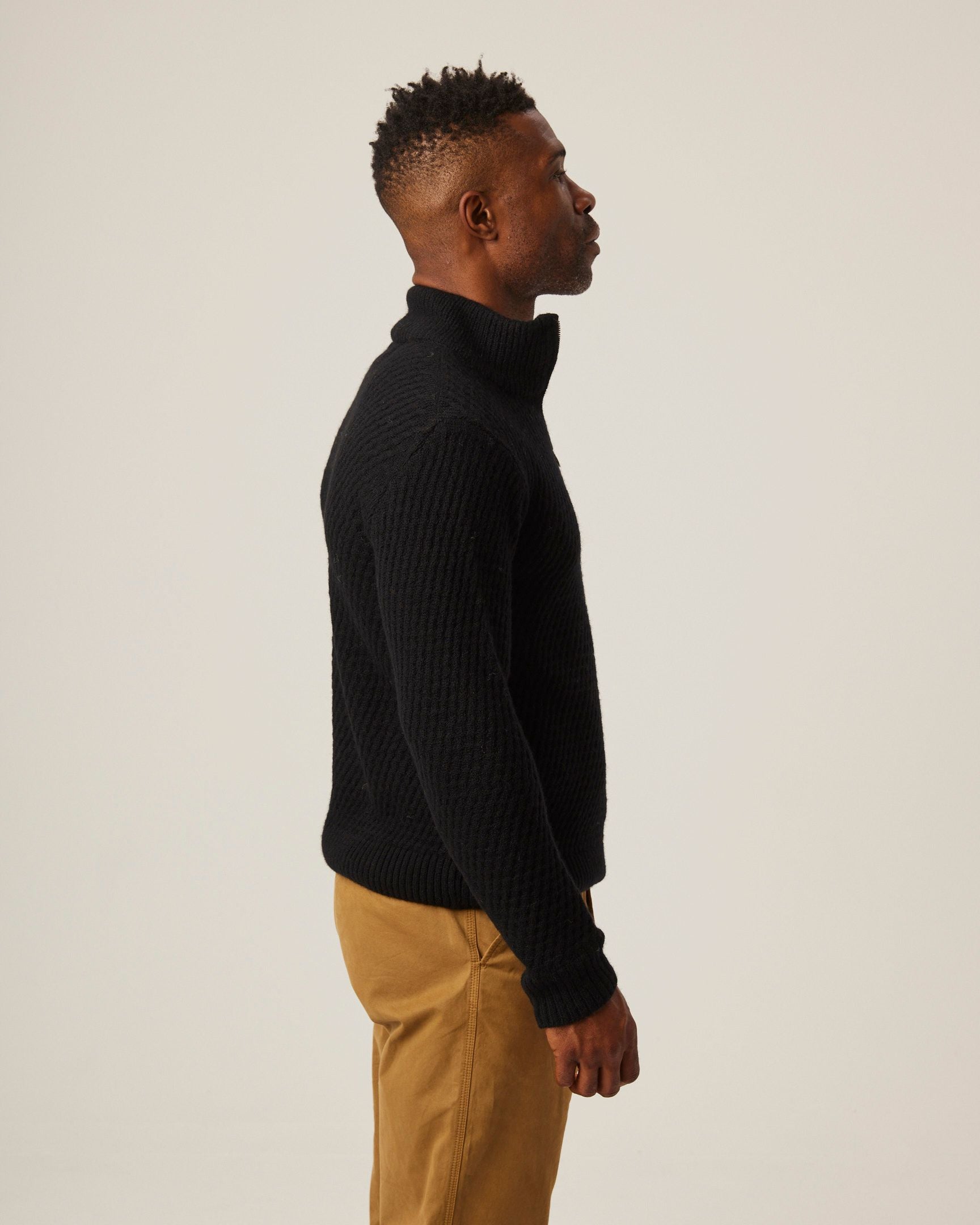 Image of model wearing Birchall Quarter Zip Jumper. 