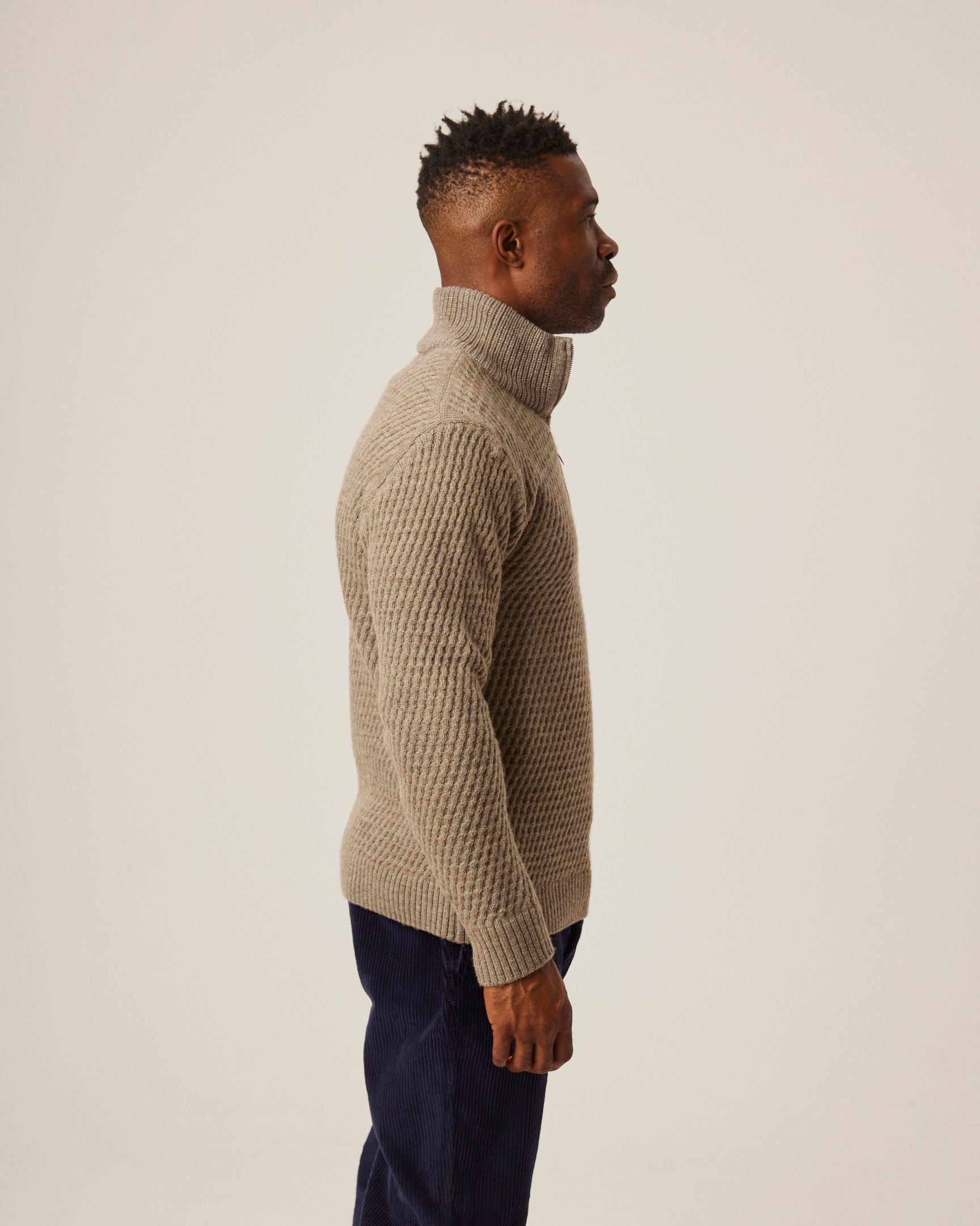 Image of model wearing Birchall Quarter Zip Jumper. 