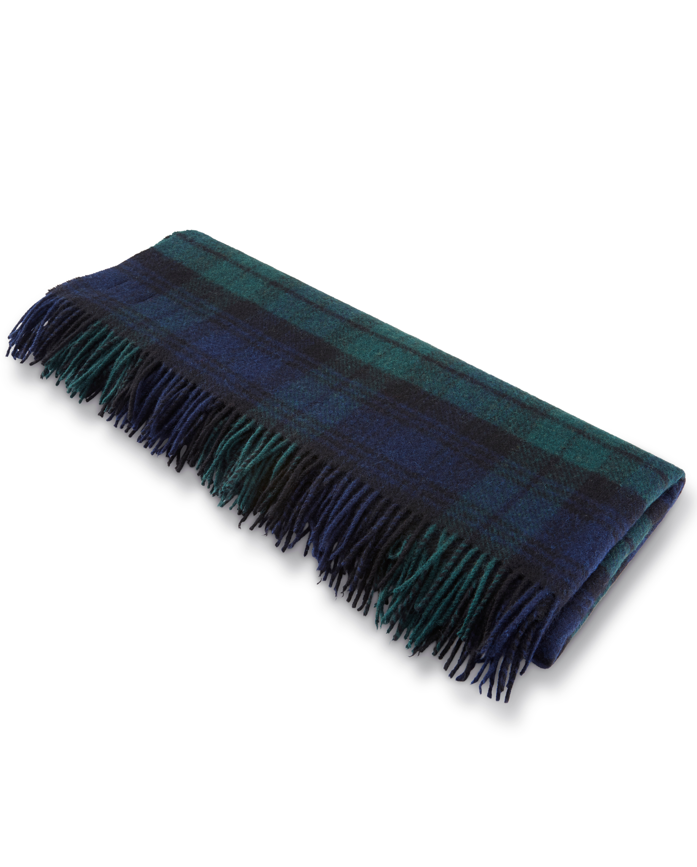 Image of model wearing Wool Blanket. SIZE: 185CM X 140CM (INCLUDES FRINGE)