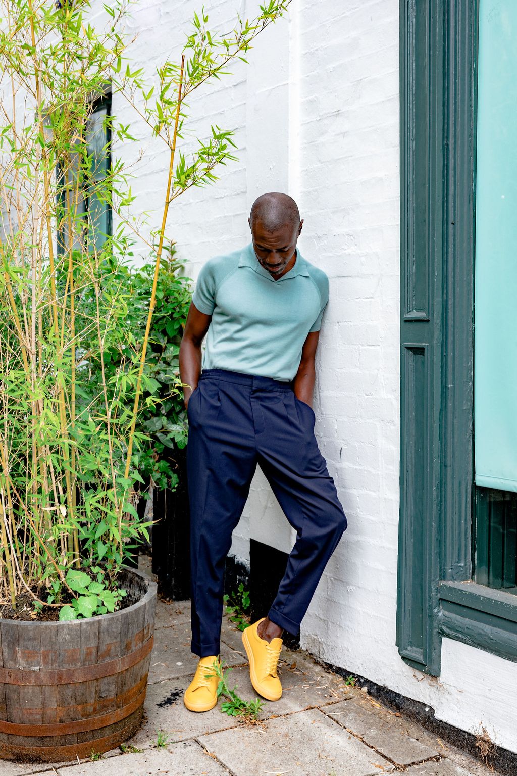 Image of model wearing Knitted Emery Polo Shirt. Model is 6ft, chest size 36in and wearing size Medium
