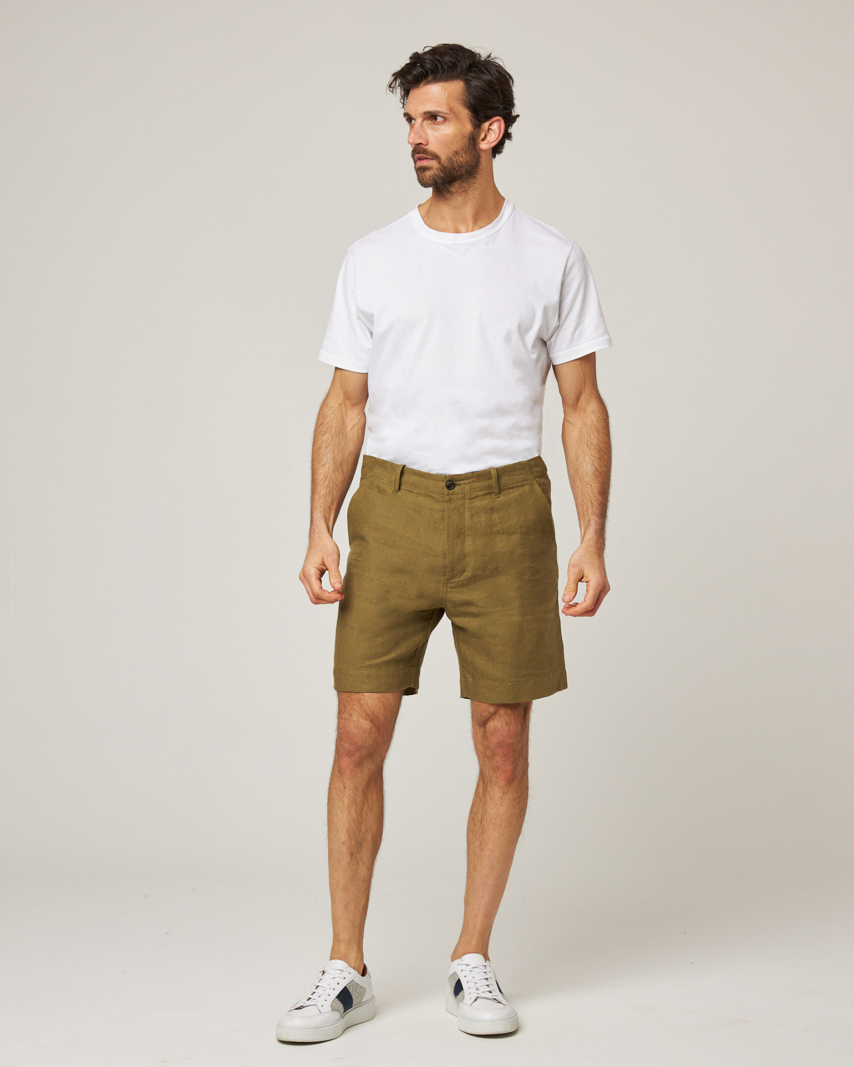 Image of model wearing Grange Linen Shorts. 