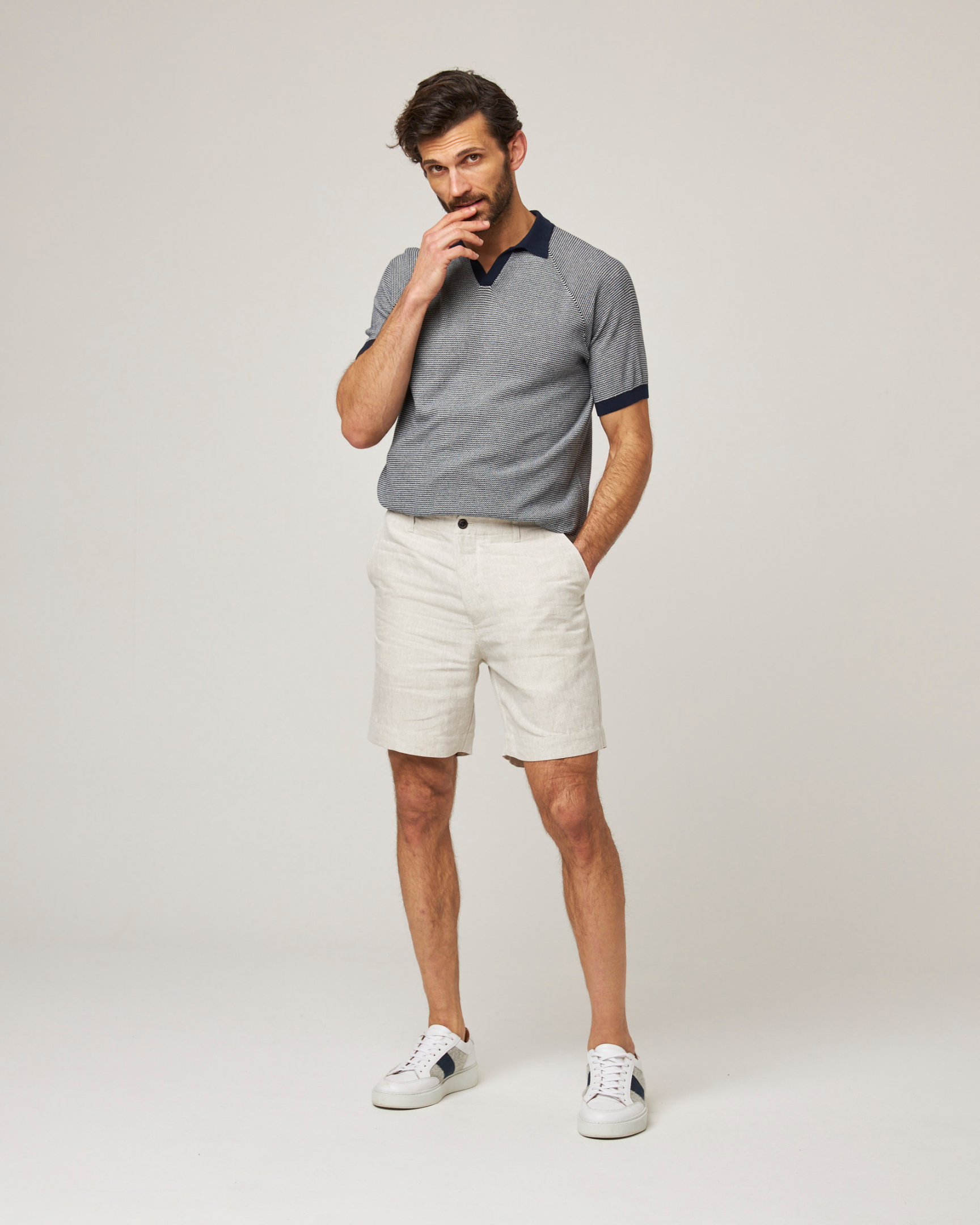 Image of model wearing Grange Linen Shorts. 