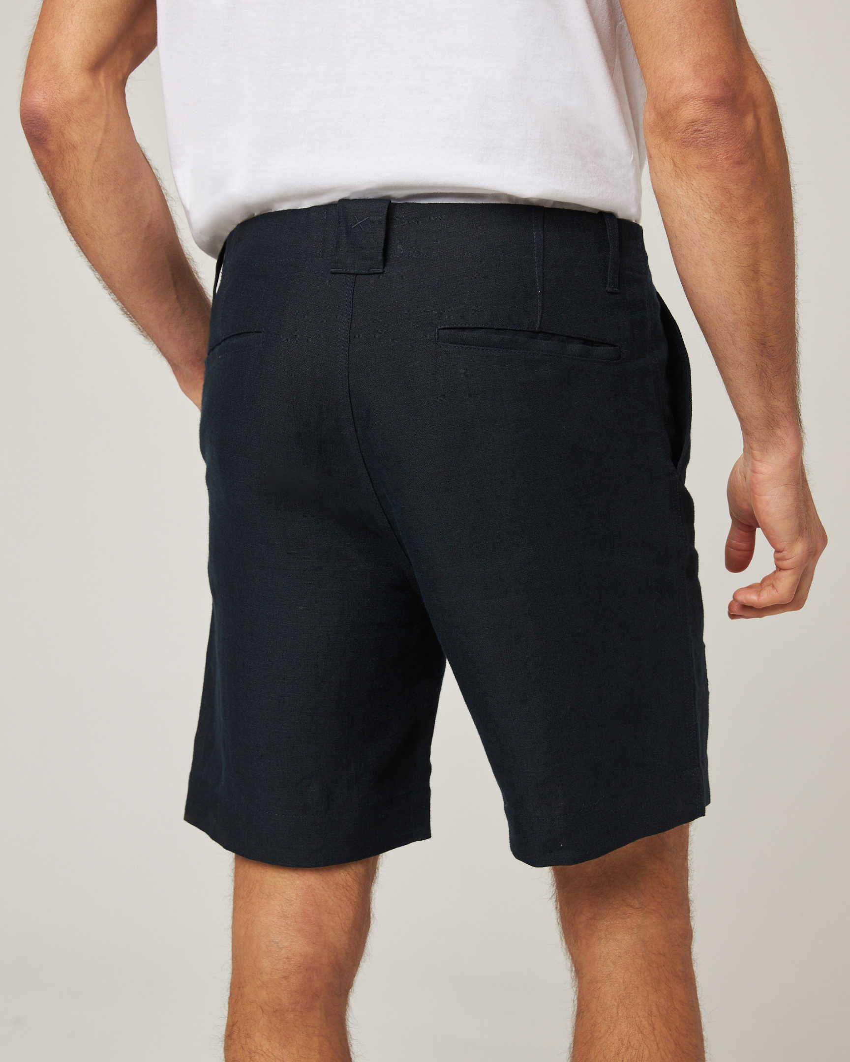 Image of model wearing Grange Linen Shorts. 