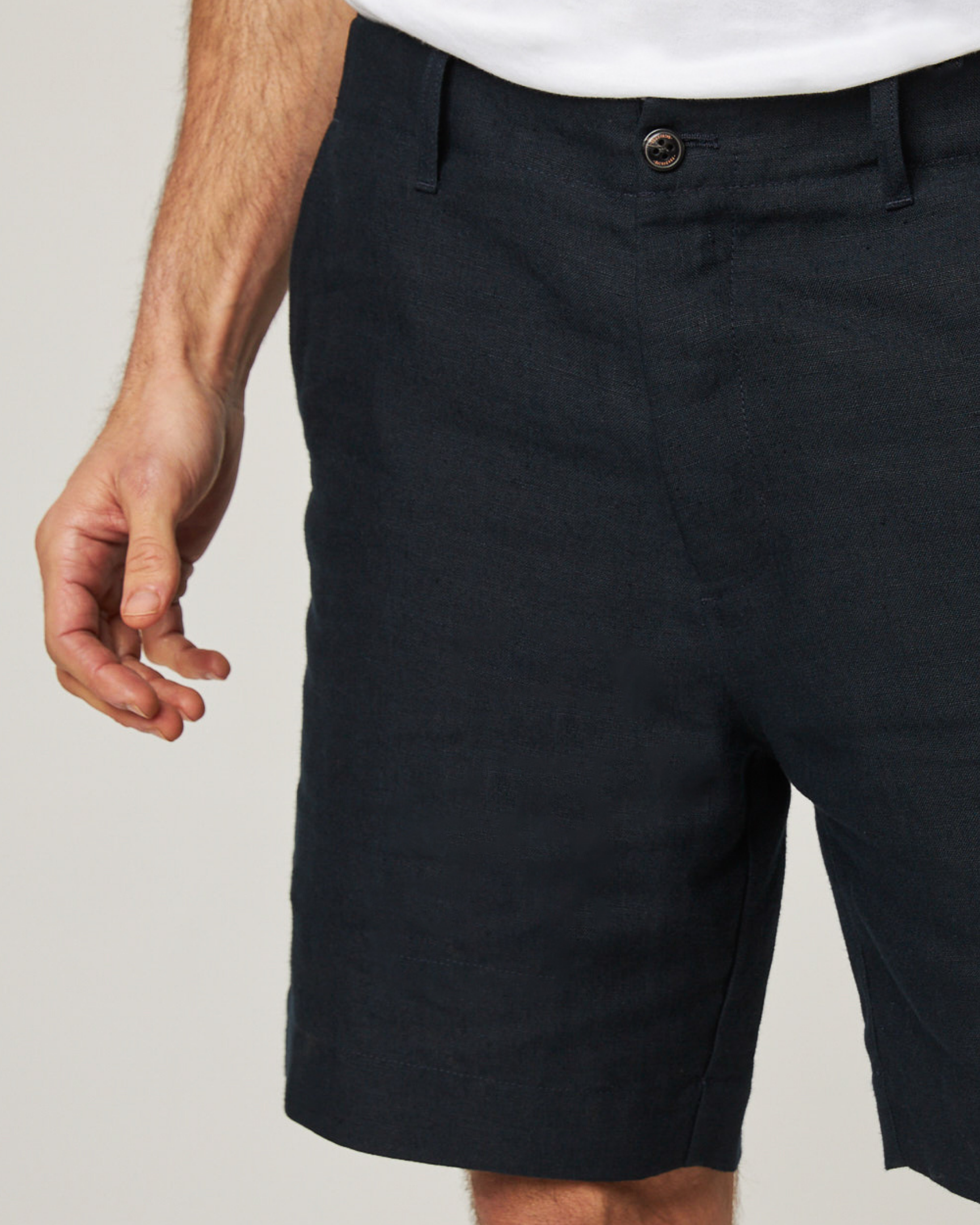 Image of model wearing Grange Linen Shorts. 