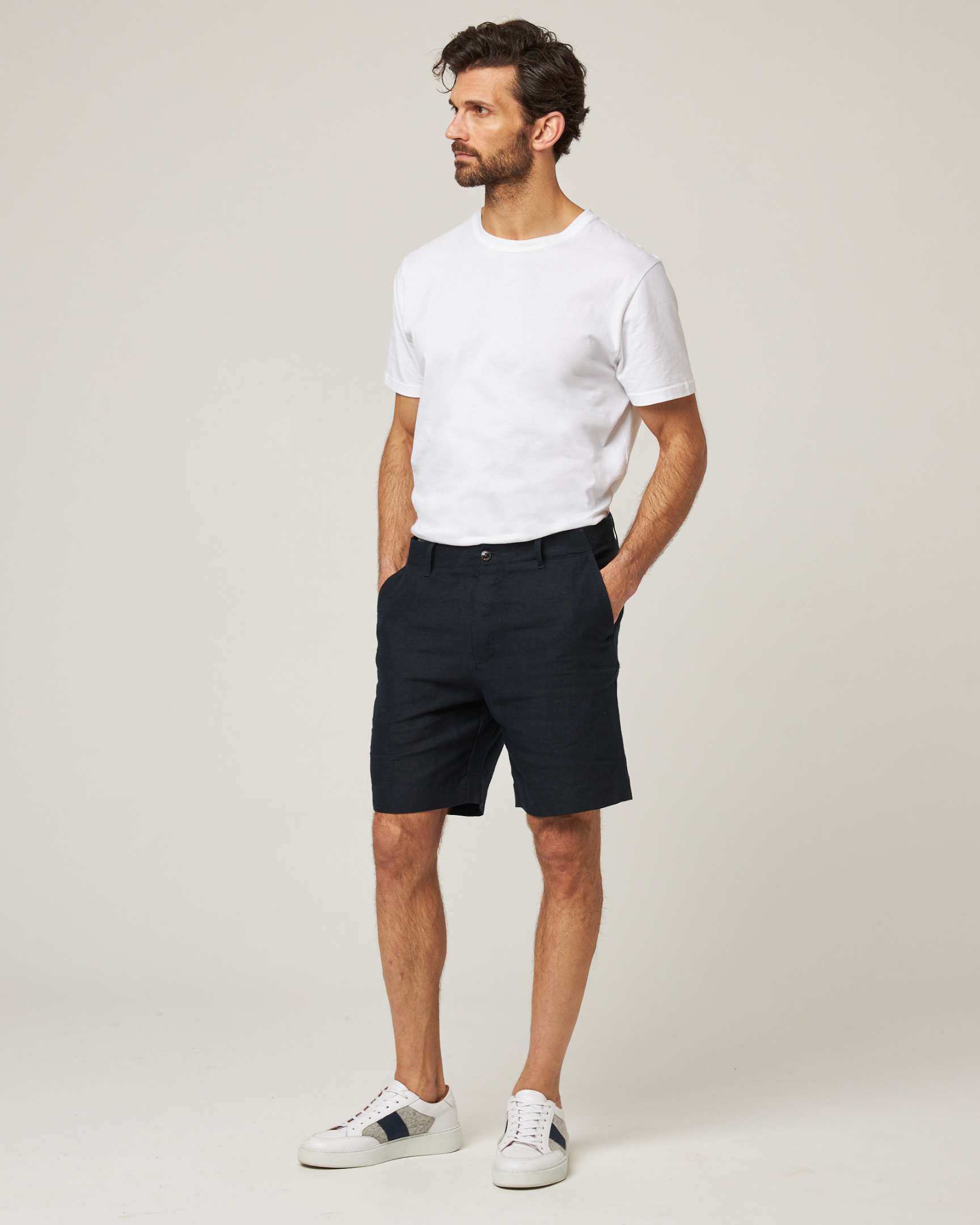Image of model wearing Grange Linen Shorts. 