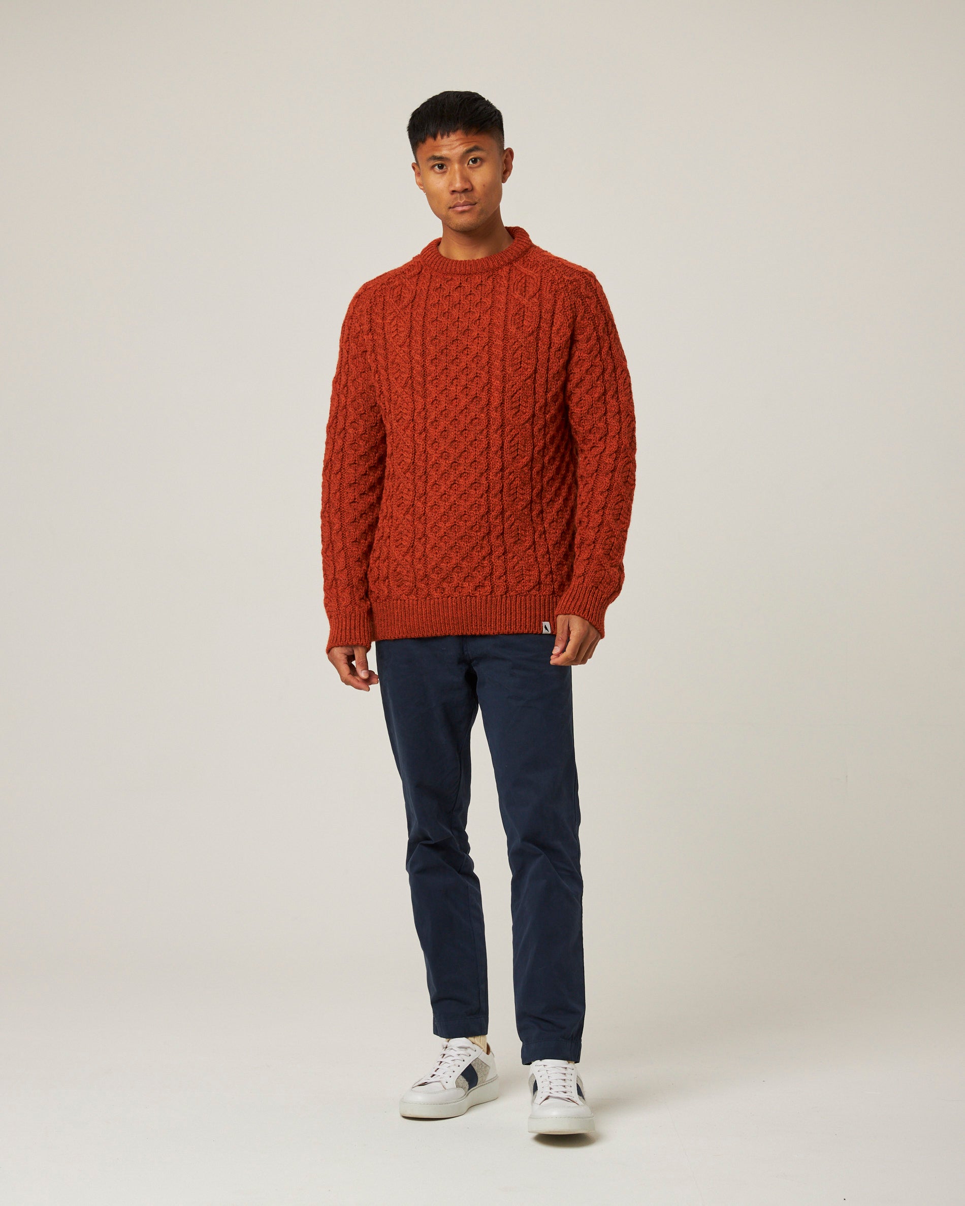 Image of model wearing Hudson Aran Jumper. Model is 6ft, chest size 36in and wearing size Medium