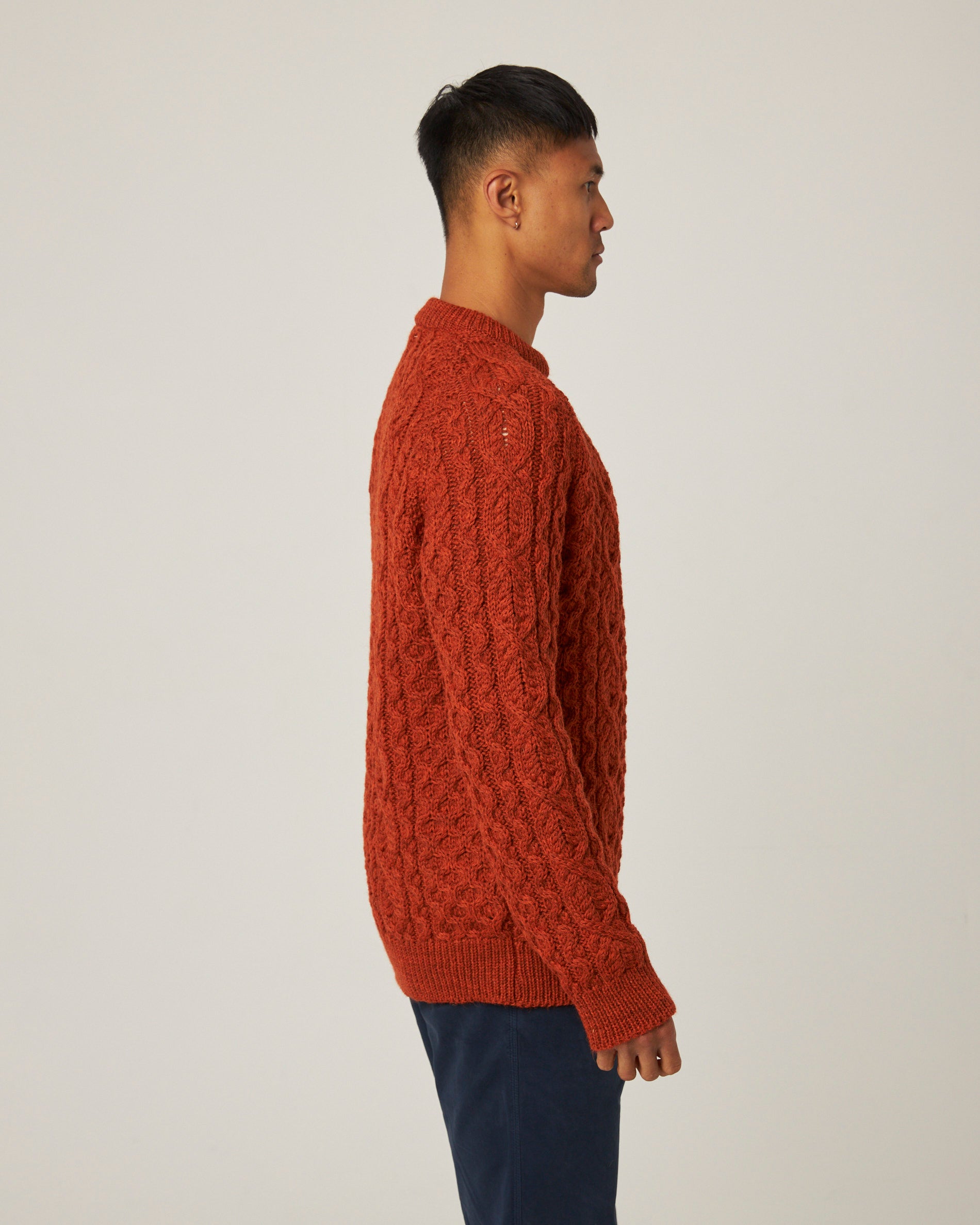 Image of model wearing Hudson Aran Jumper. Model is 6ft, chest size 36in and wearing size Medium
