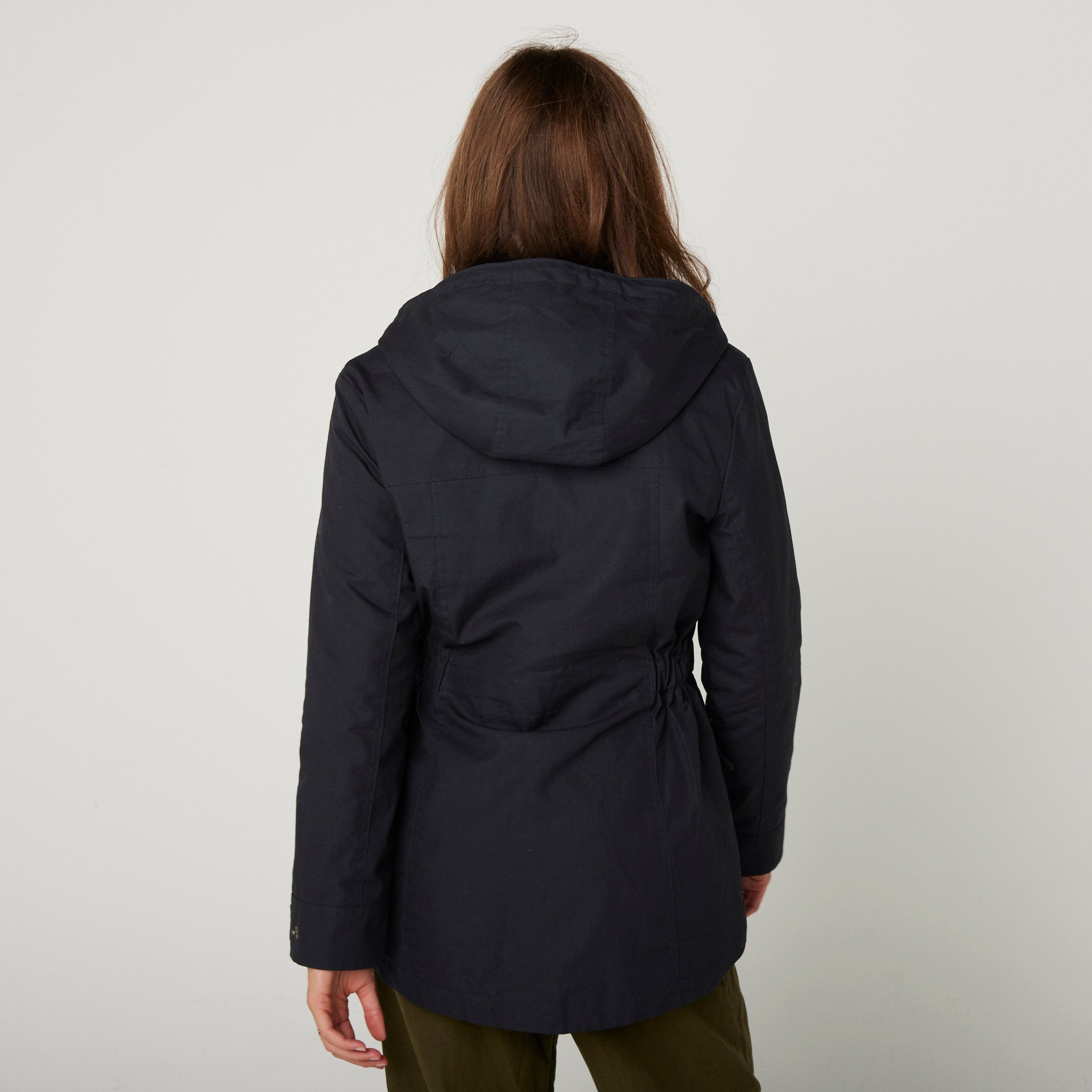 Image of model wearing Hybrid Jacket. Model is 5ft8, size UK 8 and wearing size Small