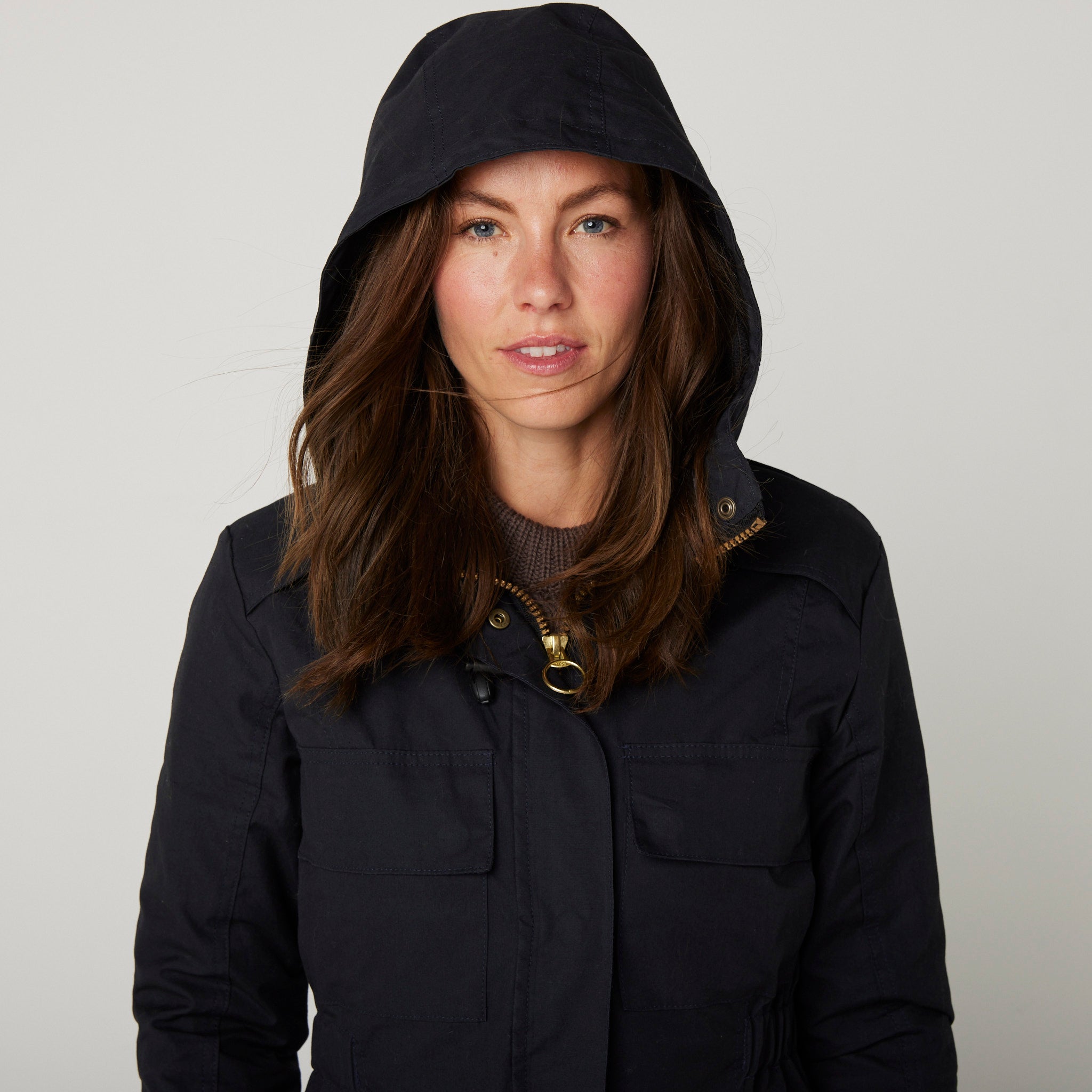 Image of model wearing Hybrid Jacket. Model is 5ft8, size UK 8 and wearing size Small