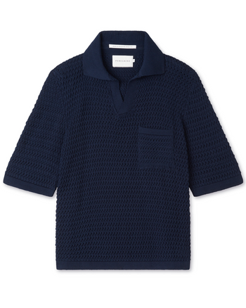 Image of model wearing Island Crochet Polo Shirt. 