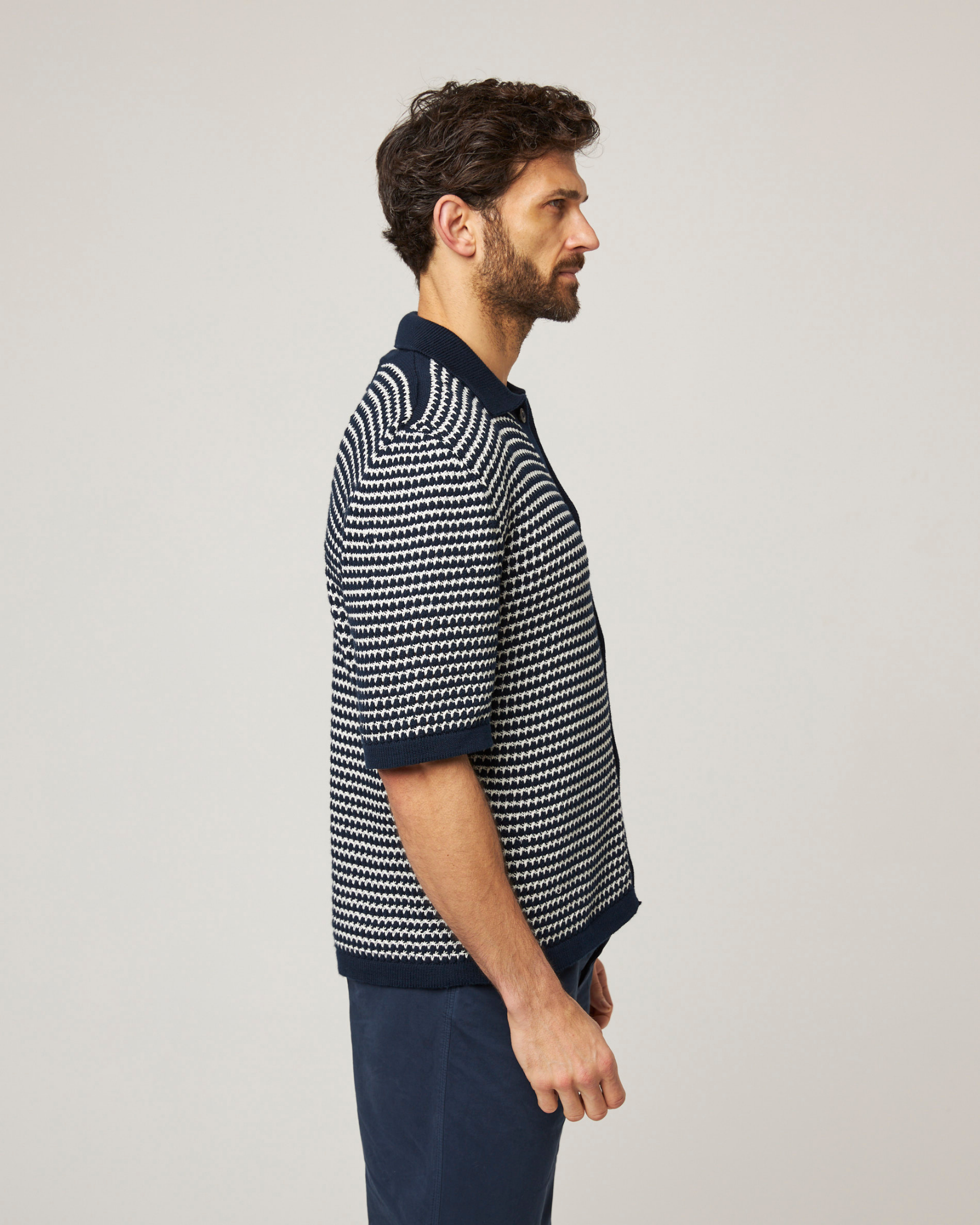 Image of model wearing Island Crochet Shirt. 