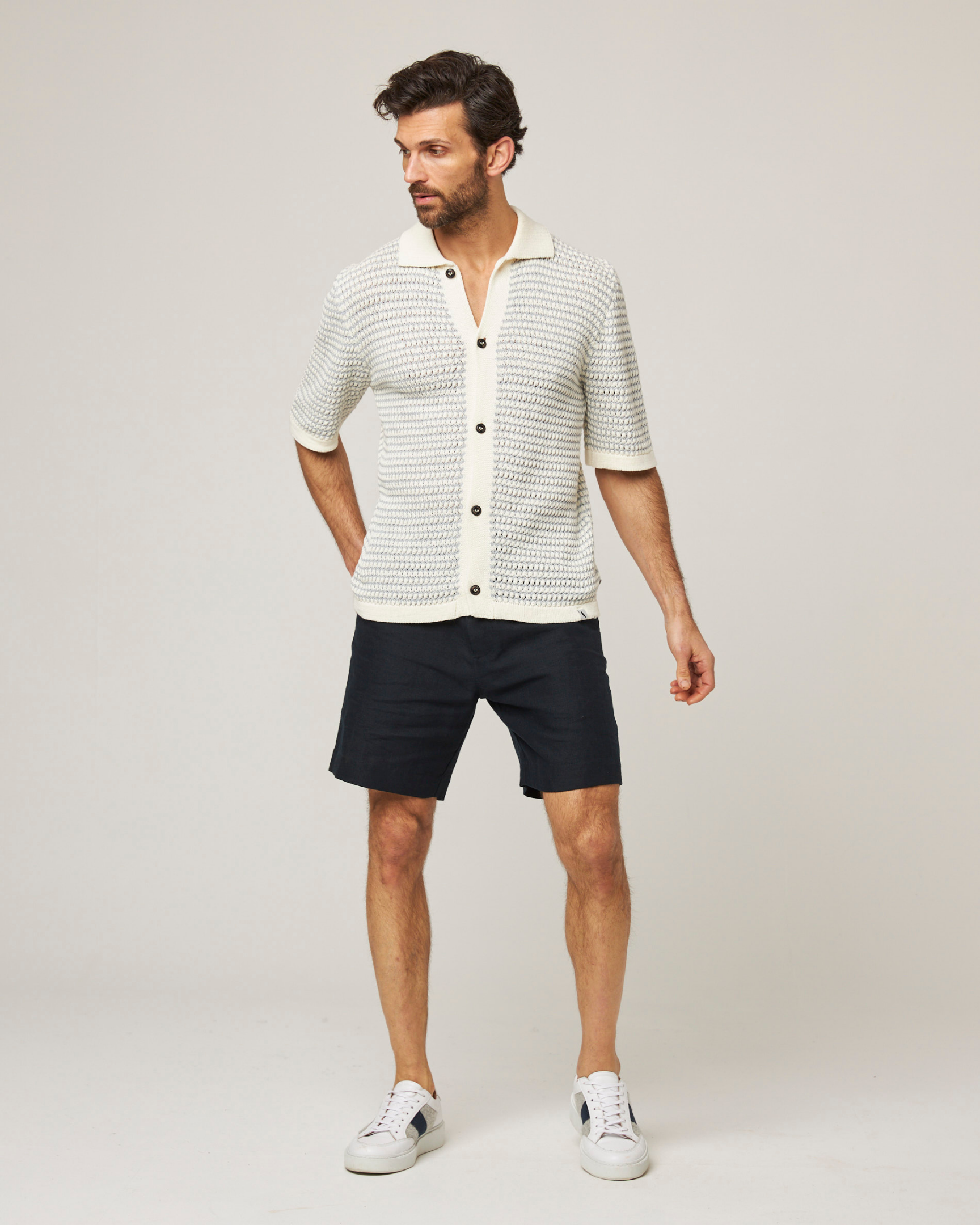 Image of model wearing Island Crochet Shirt. 