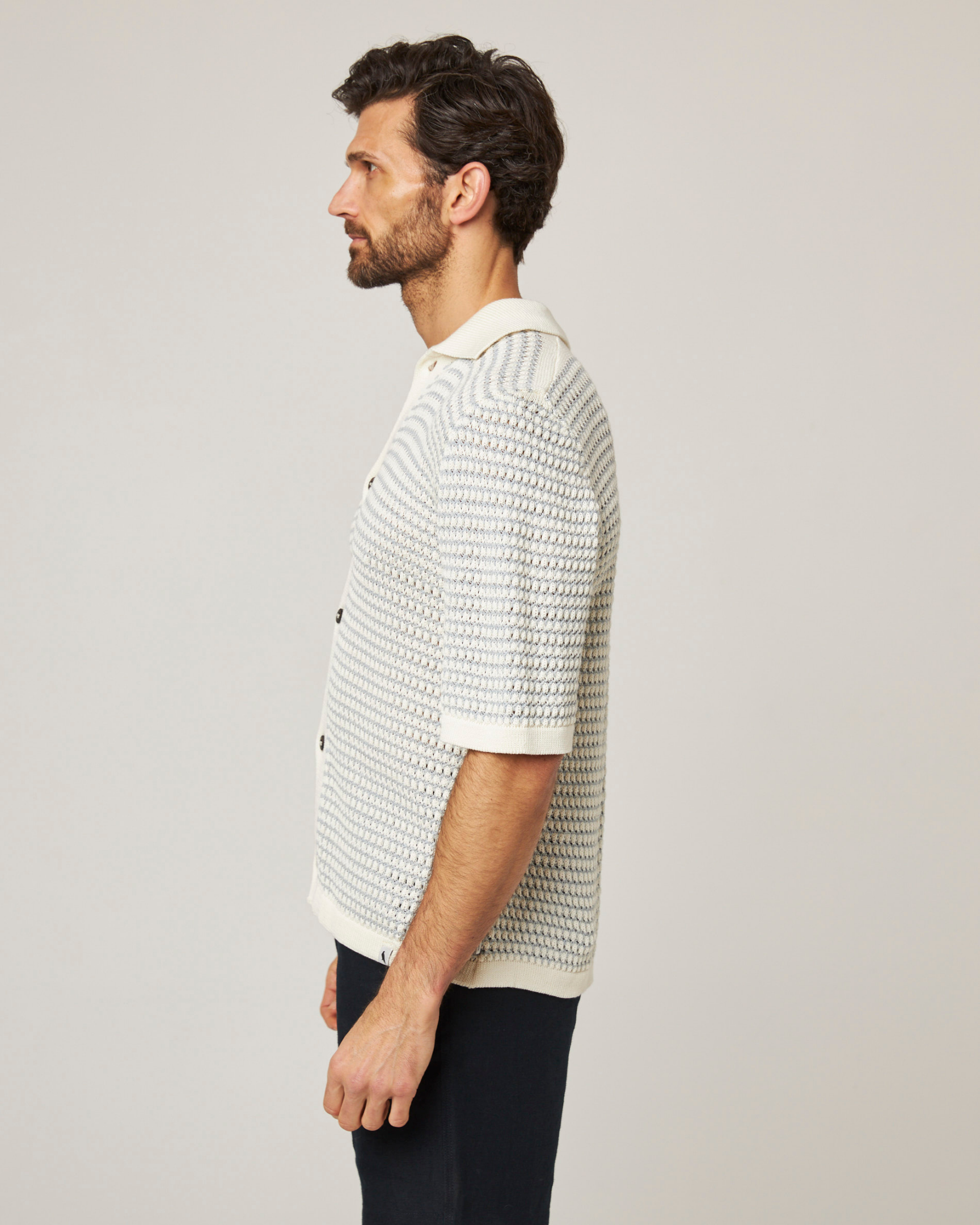 Image of model wearing Island Crochet Shirt. 