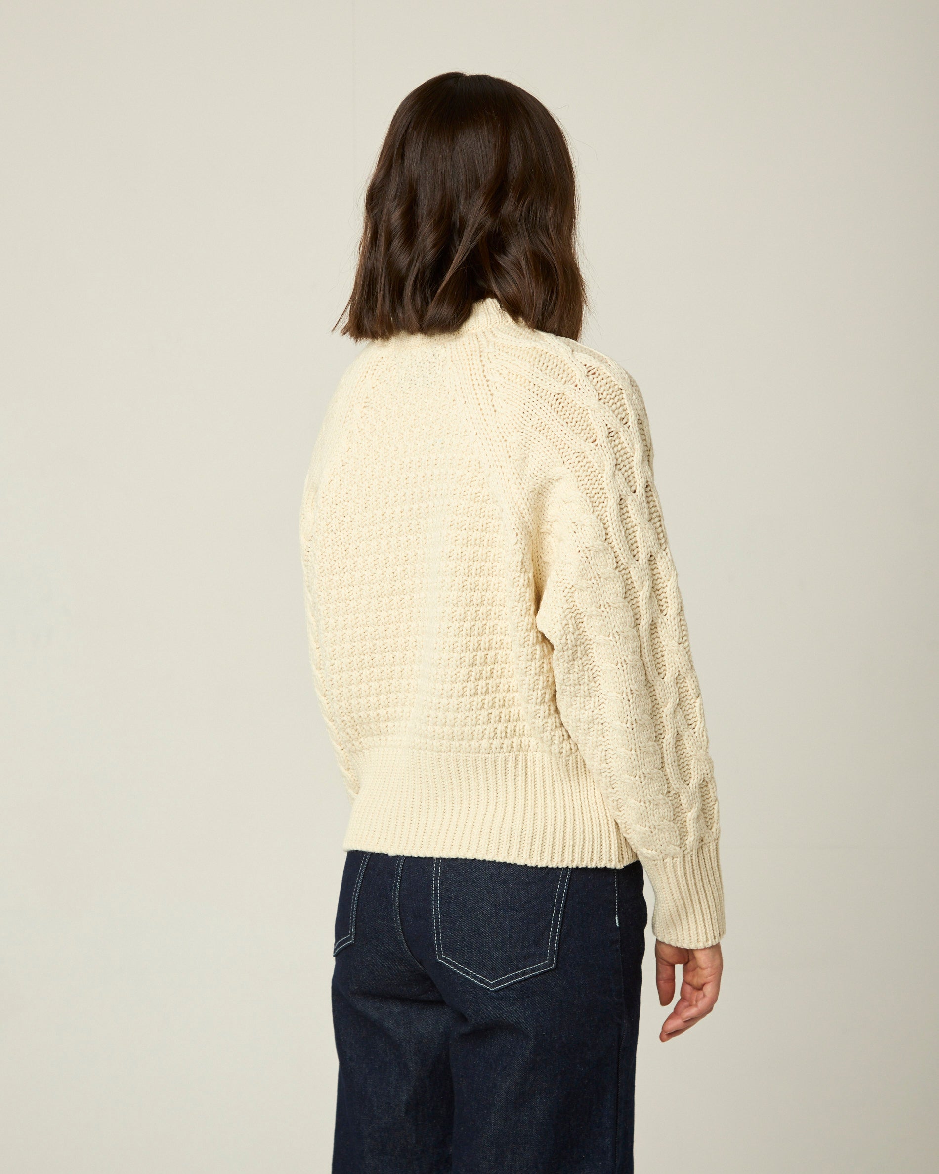 Image of model wearing Isobel Aran Jumper. Model is 5ft8, size UK 8 and wearing size Small