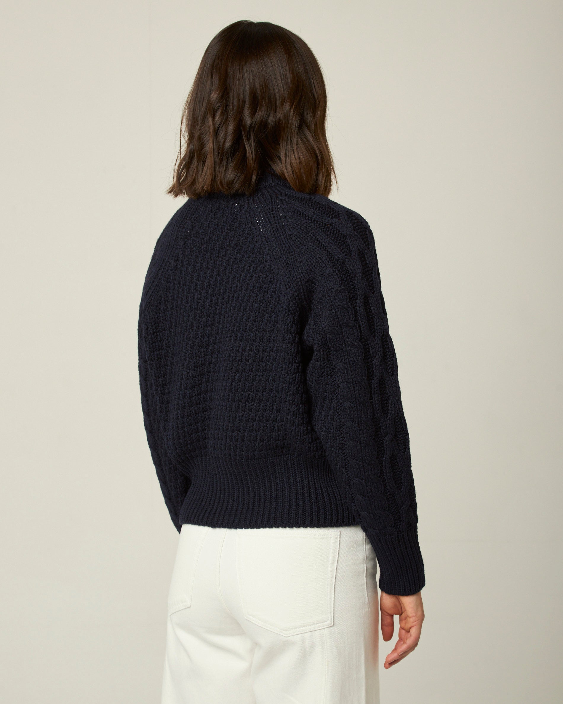 Image of model wearing Isobel Aran Jumper. Model is 5ft8, size UK 8 and wearing size Small