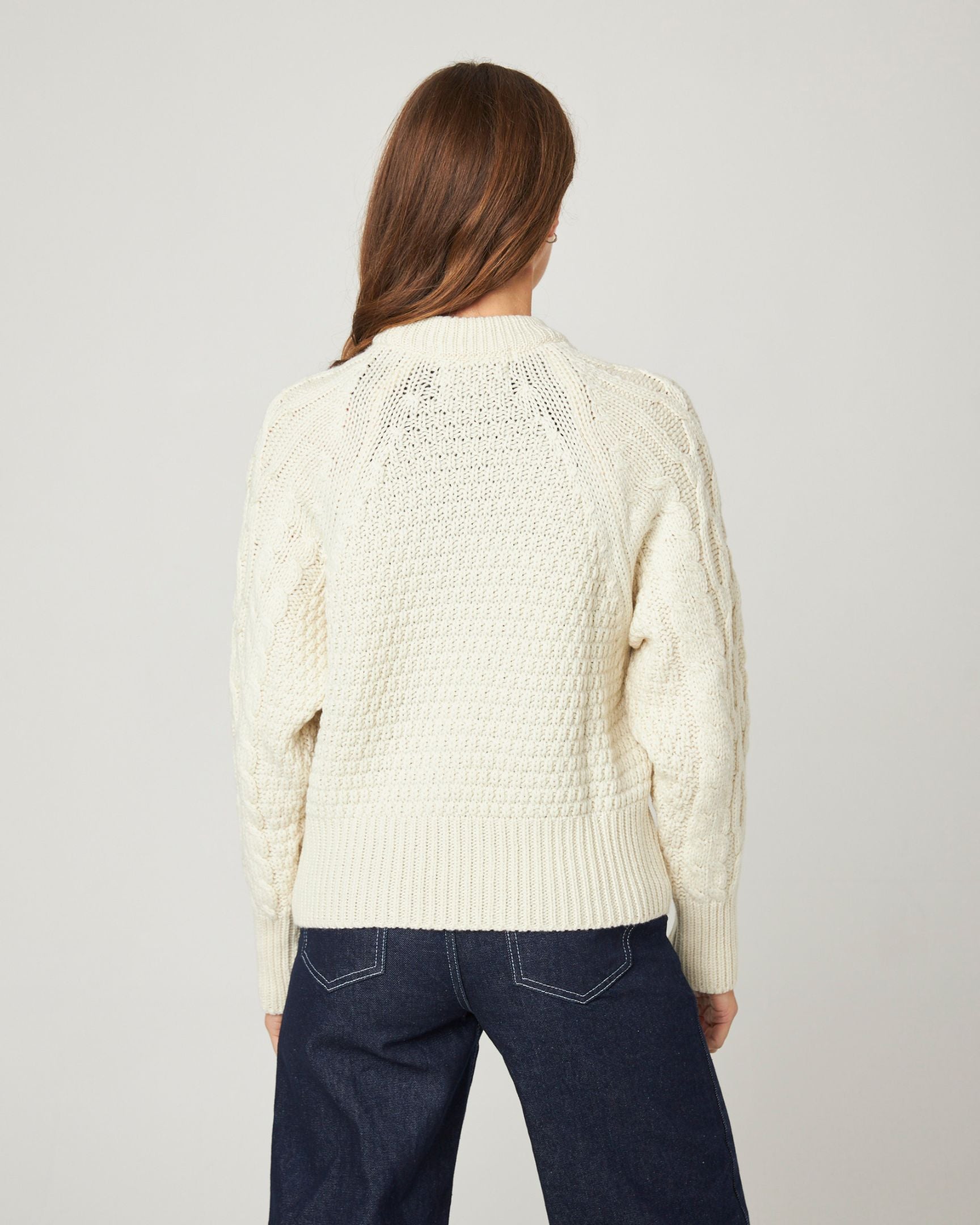 Image of model wearing Isobel Aran Jumper. Model is 5ft8, size UK 8 and wearing size Small