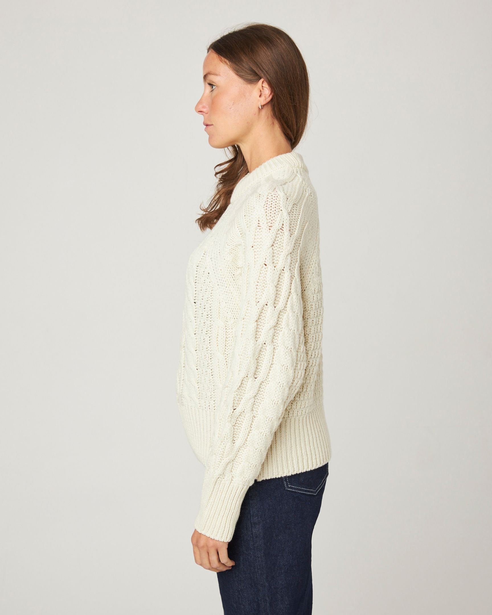 Image of model wearing Isobel Aran Jumper. Model is 5ft8, size UK 8 and wearing size Small