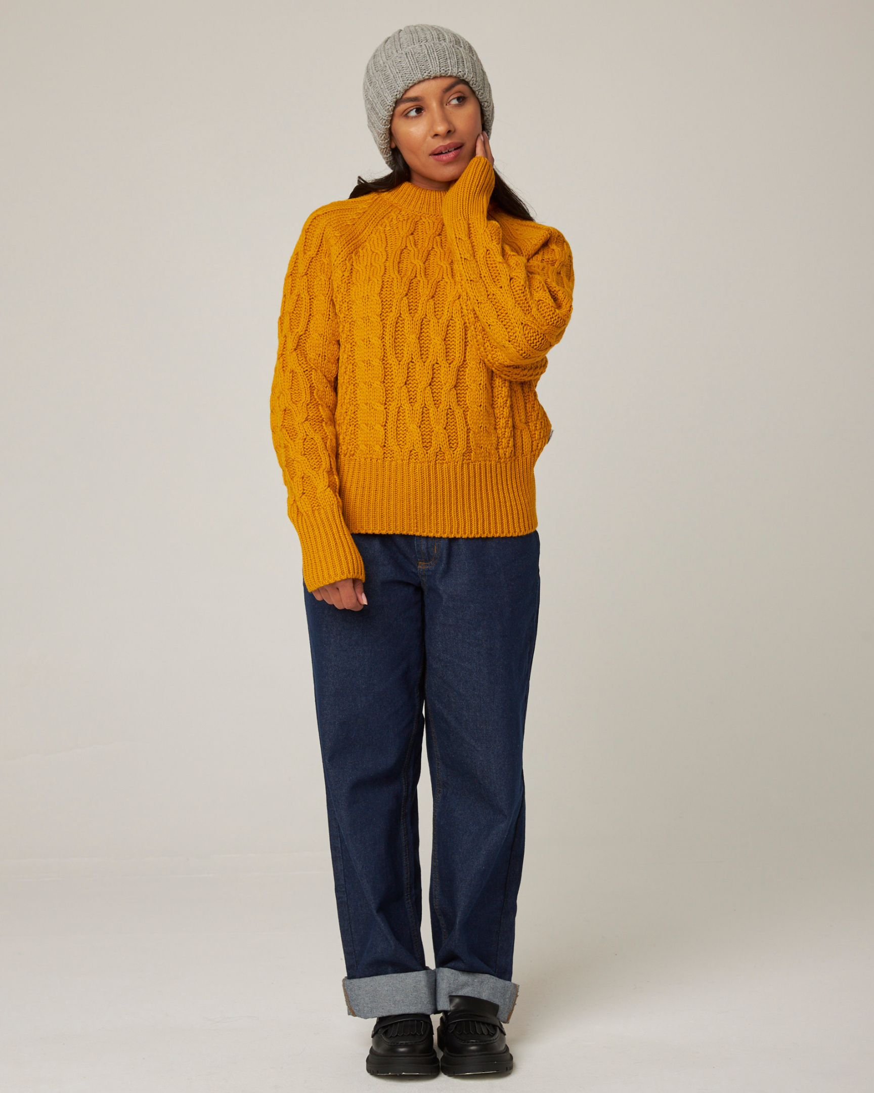 Image of model wearing Isobel Aran Jumper. Model is 5ft8, size UK 8 and wearing size Medium