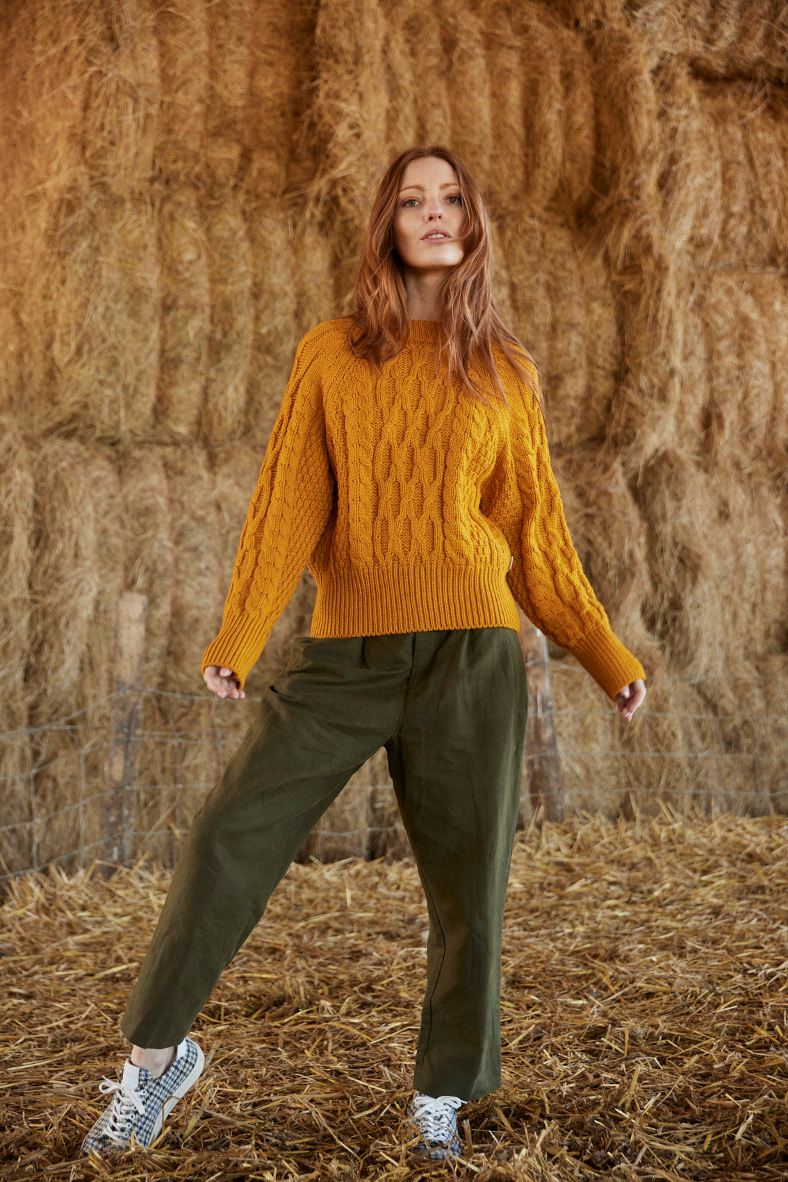 Image of model wearing Isobel Aran Jumper. Model is 5ft8, size UK 8 and wearing size Medium