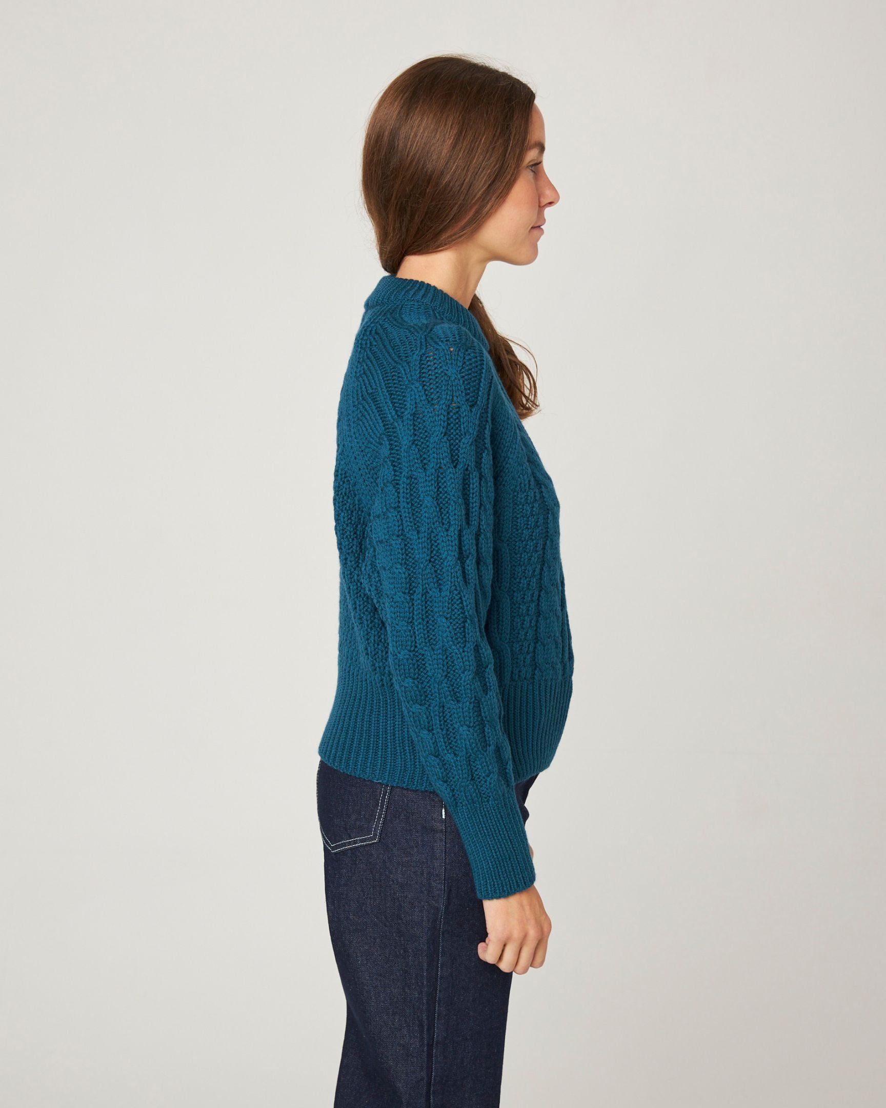 Image of model wearing Isobel Aran Jumper. Model is 5ft8, size UK 8 and wearing size Medium