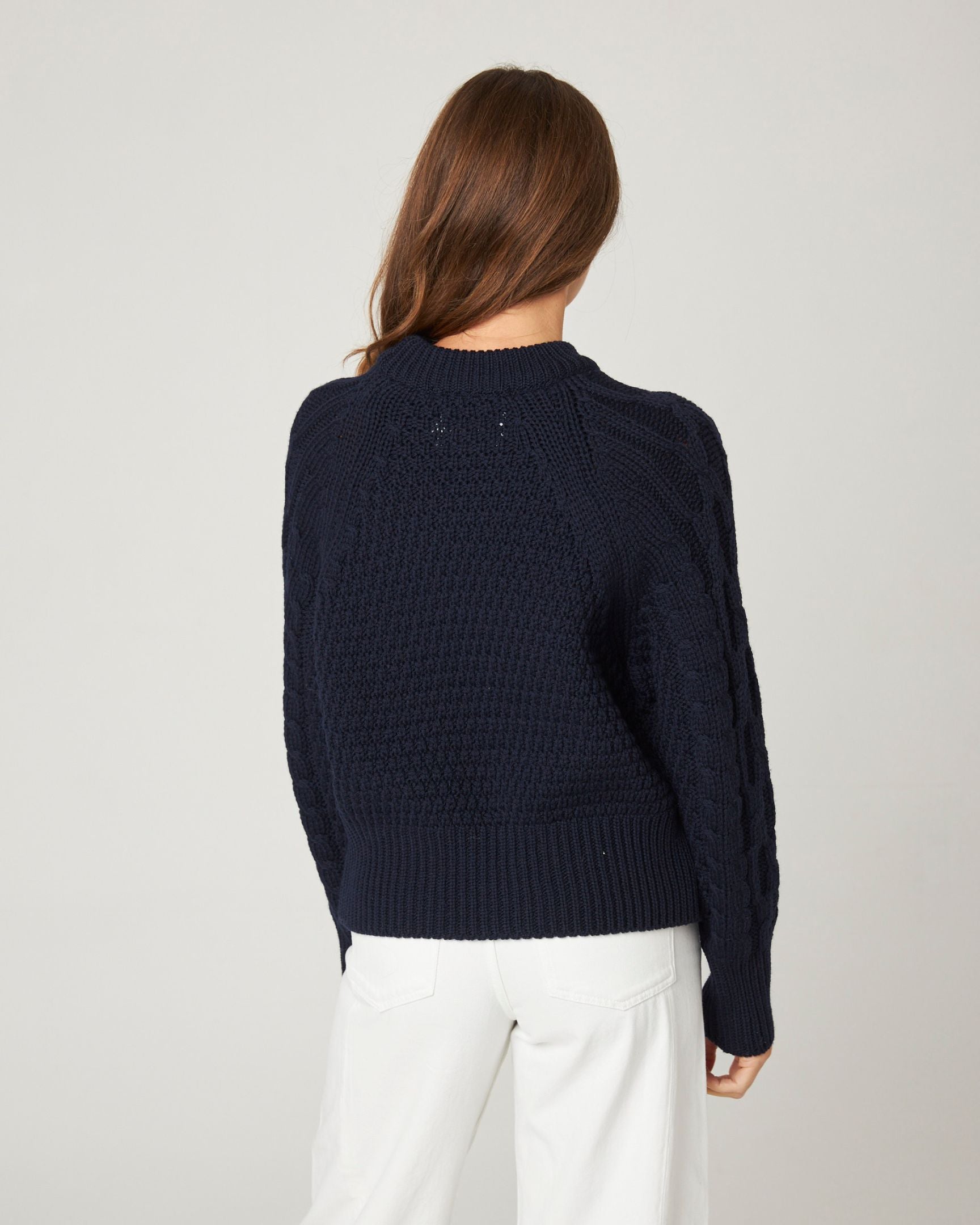 Image of model wearing Isobel Aran Jumper. Model is 5ft8, size UK 8 and wearing size Small