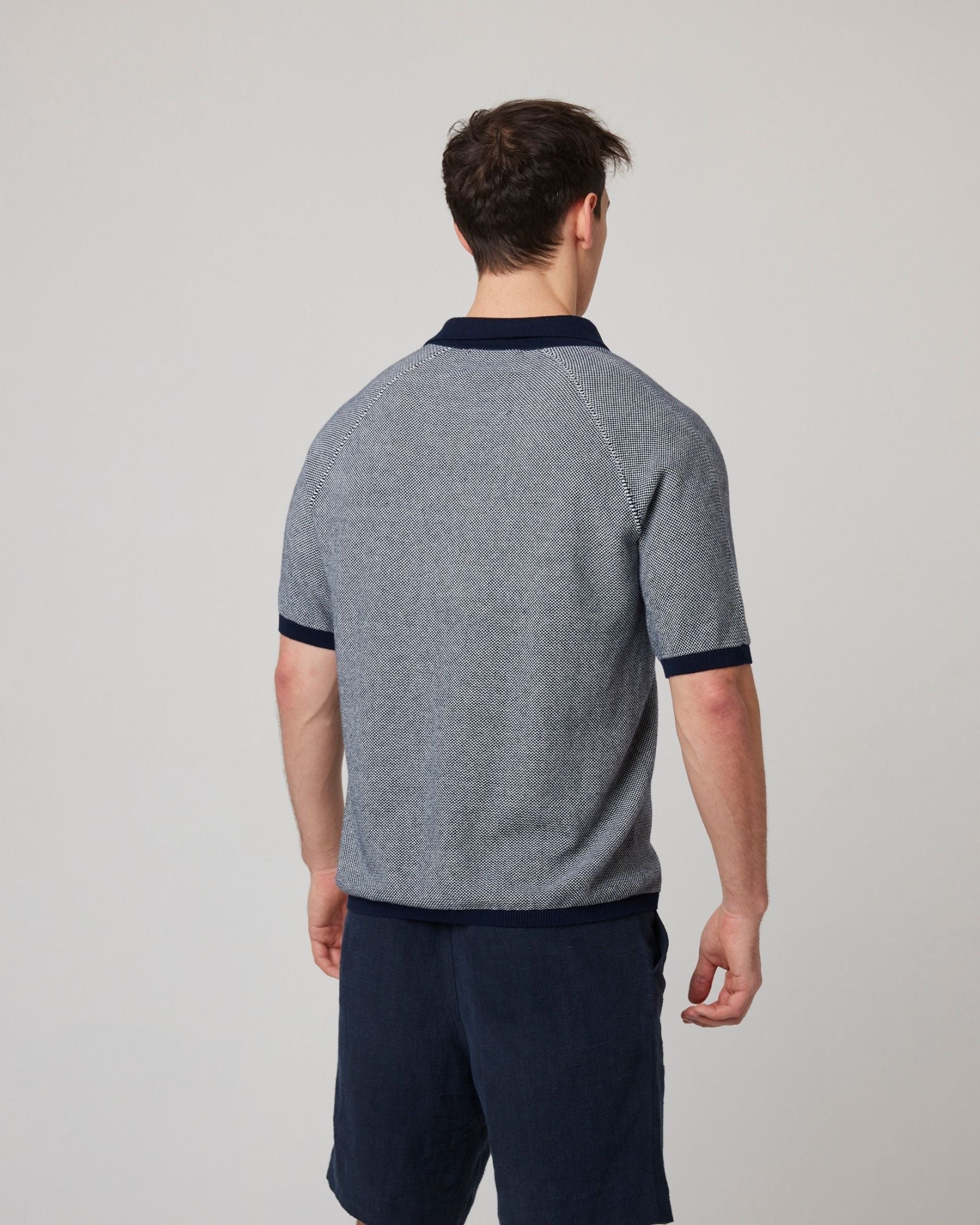 Image of model wearing Lynton Polo Shirt. 