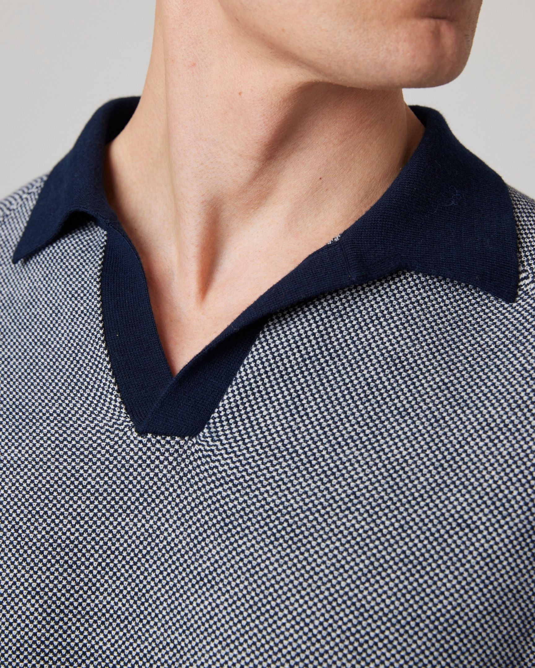 Image of model wearing Lynton Polo Shirt. 