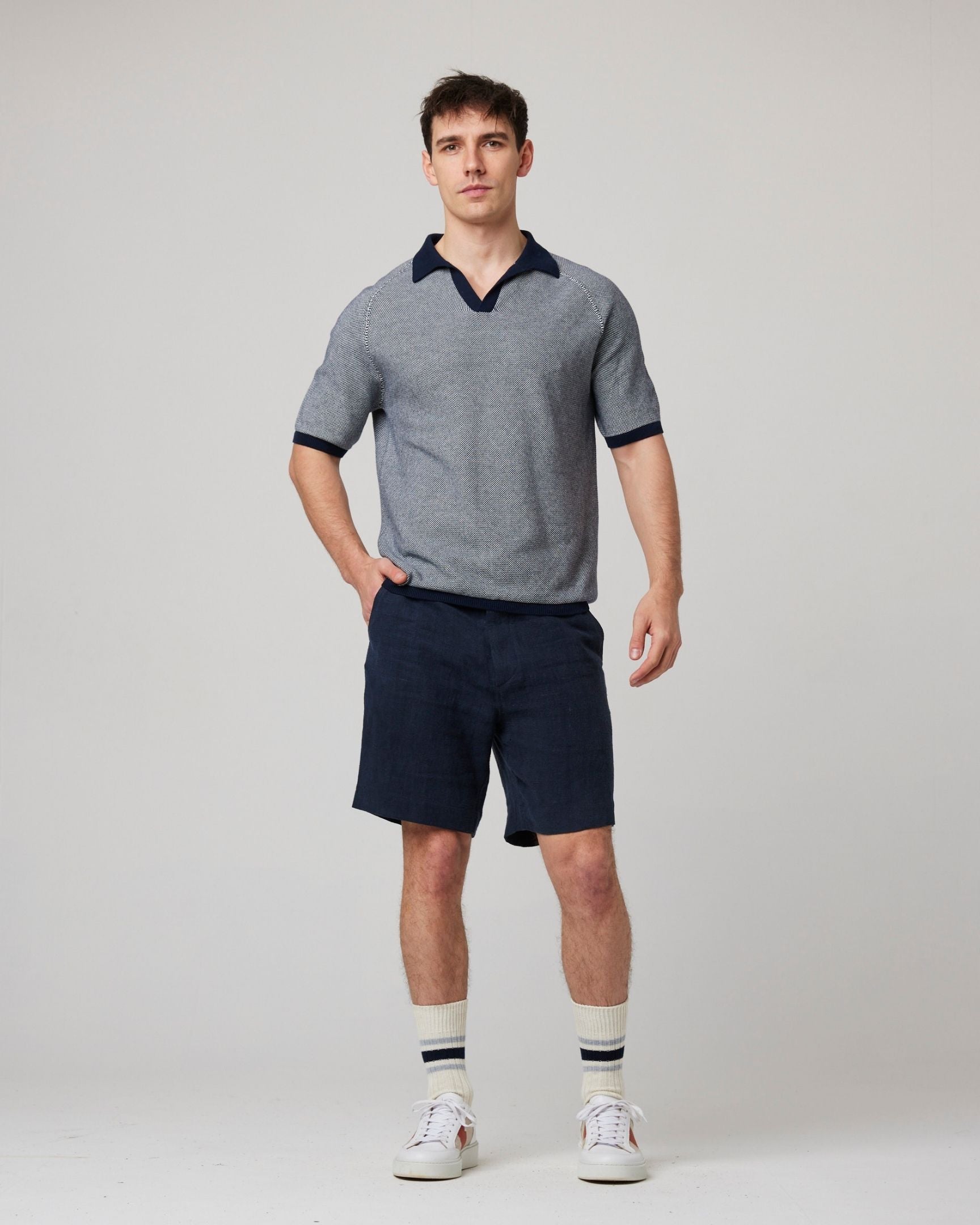 Image of model wearing Lynton Polo Shirt. 