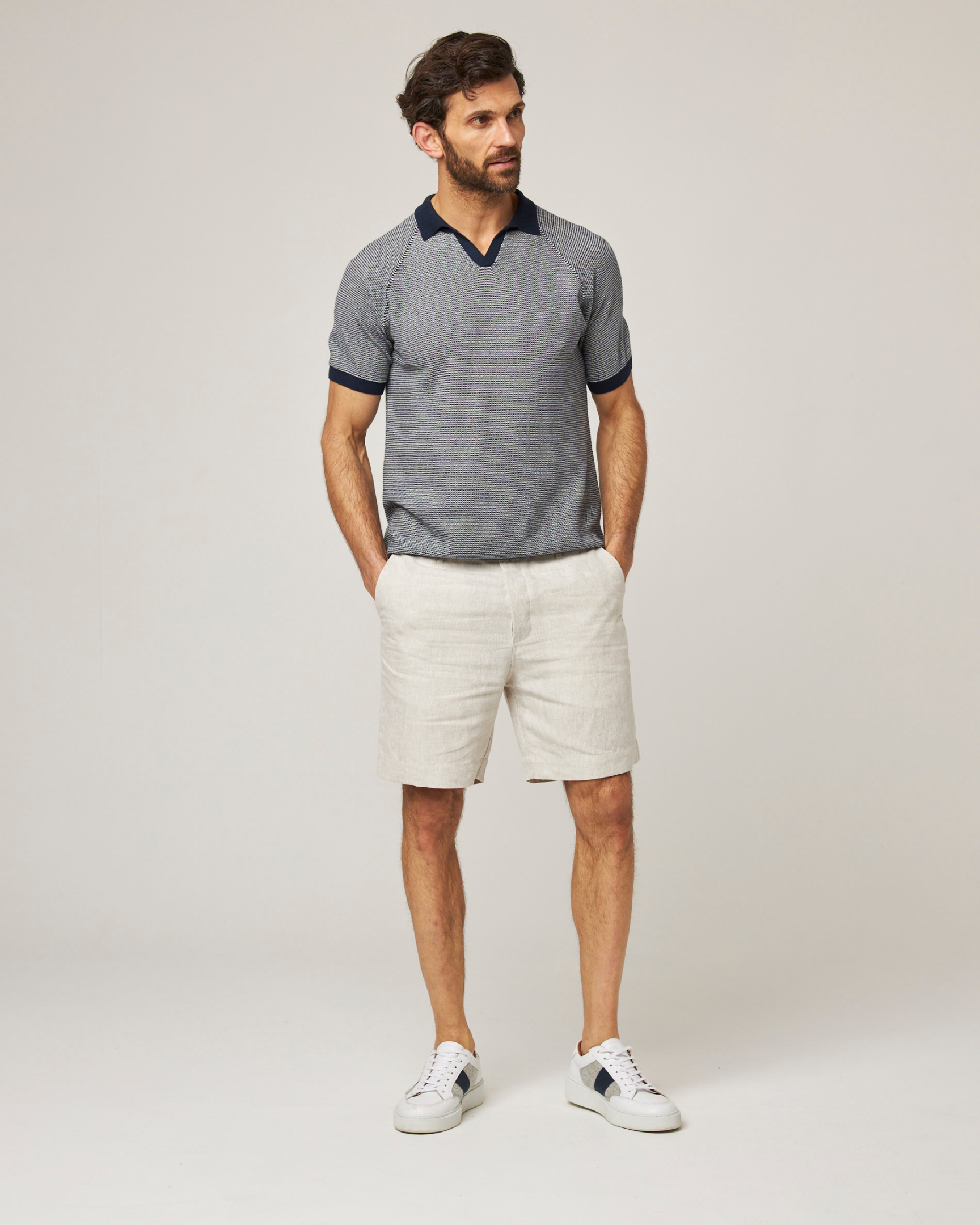 Image of model wearing Lynton Polo Shirt. 