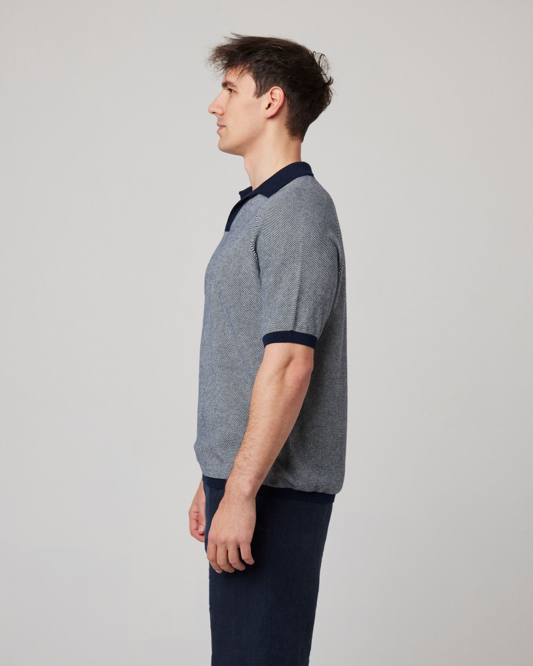 Image of model wearing Lynton Polo Shirt. 