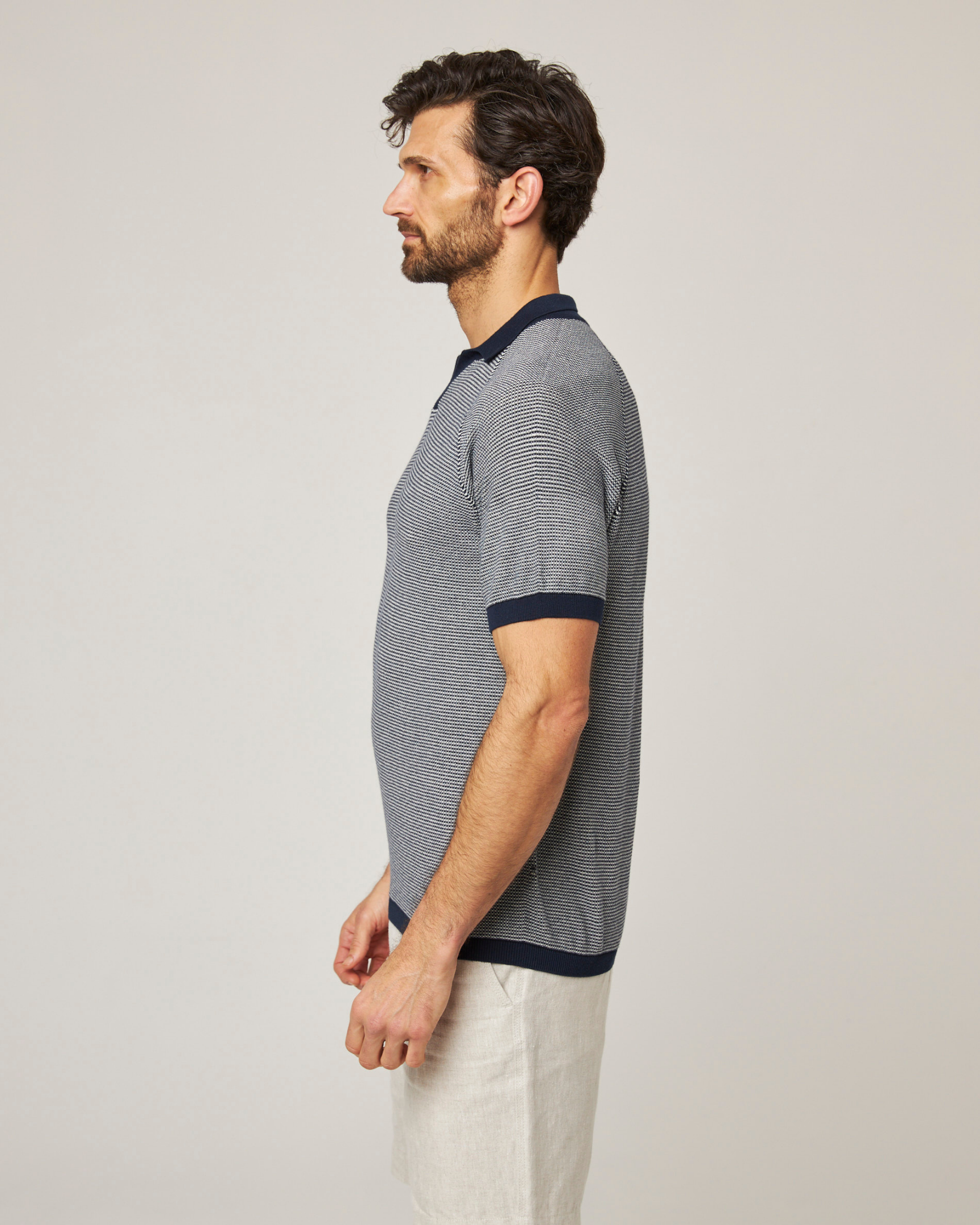 Image of model wearing Lynton Polo Shirt. 