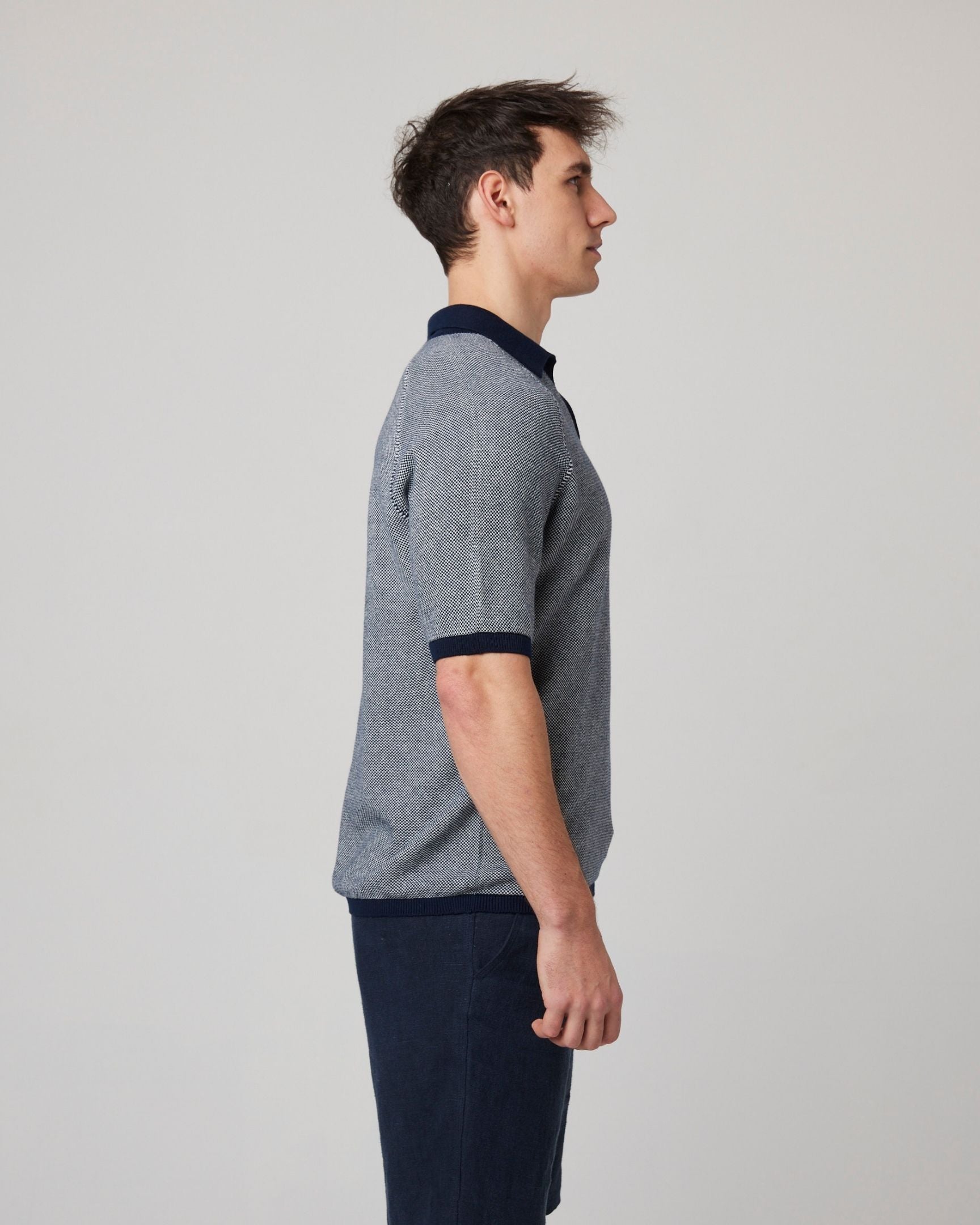 Image of model wearing Lynton Polo Shirt. 
