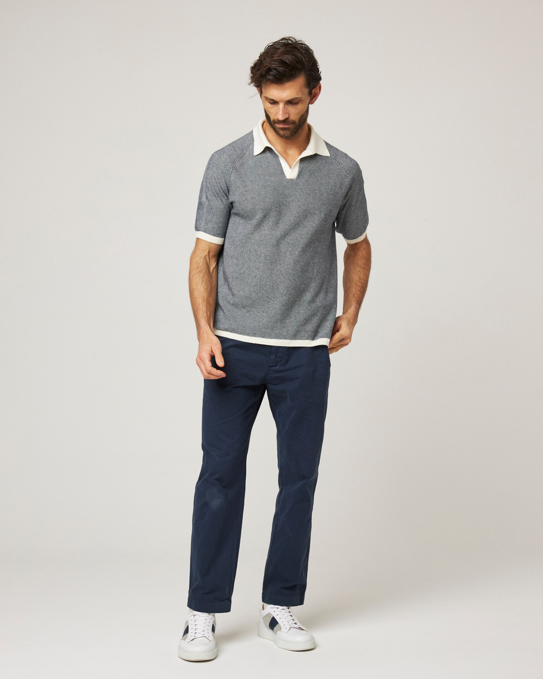 Image of model wearing Lynton Polo Shirt. 