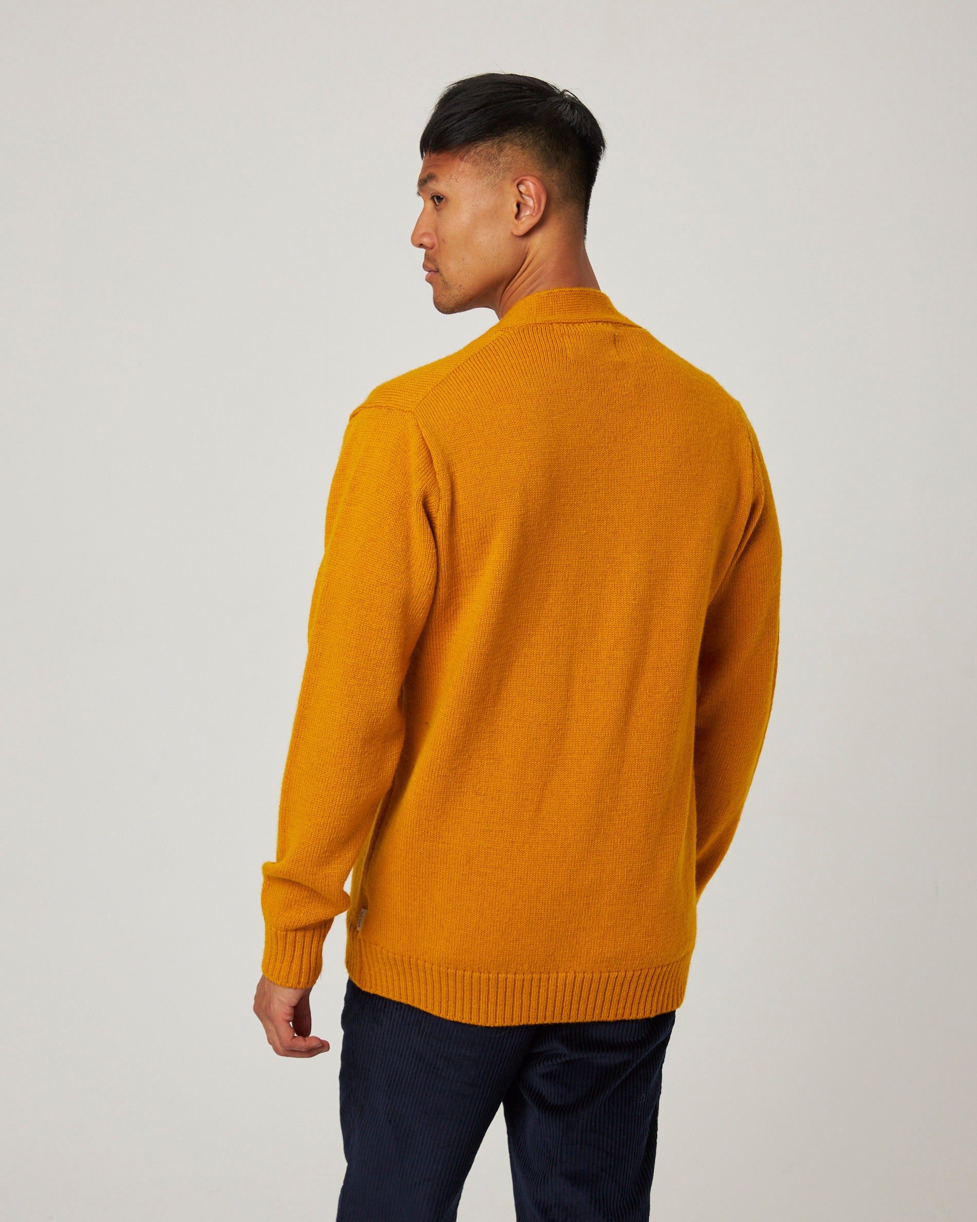 Image of model wearing Makers Cardigan. 