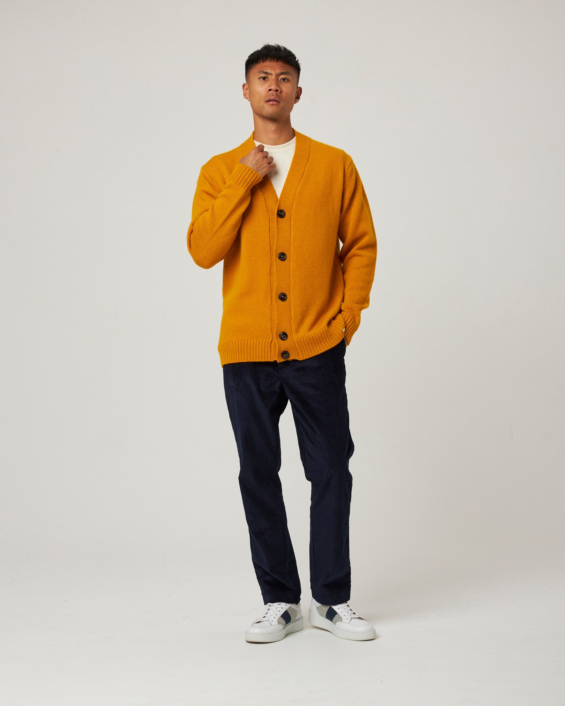 Image of model wearing Makers Cardigan. 