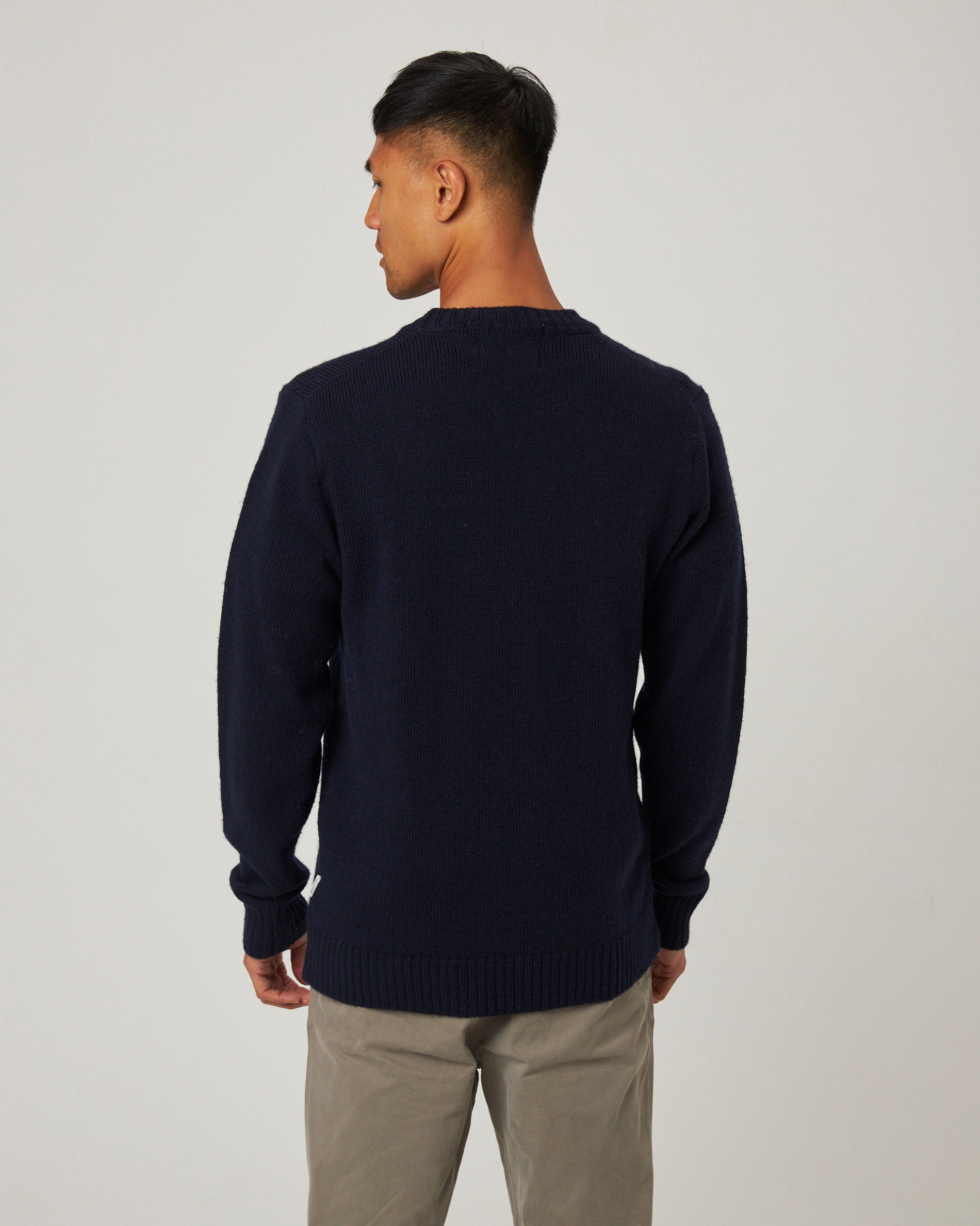 Image of model wearing Makers Stitch Jumper. Model is 6ft1in, chest size 38in and wearing size Medium