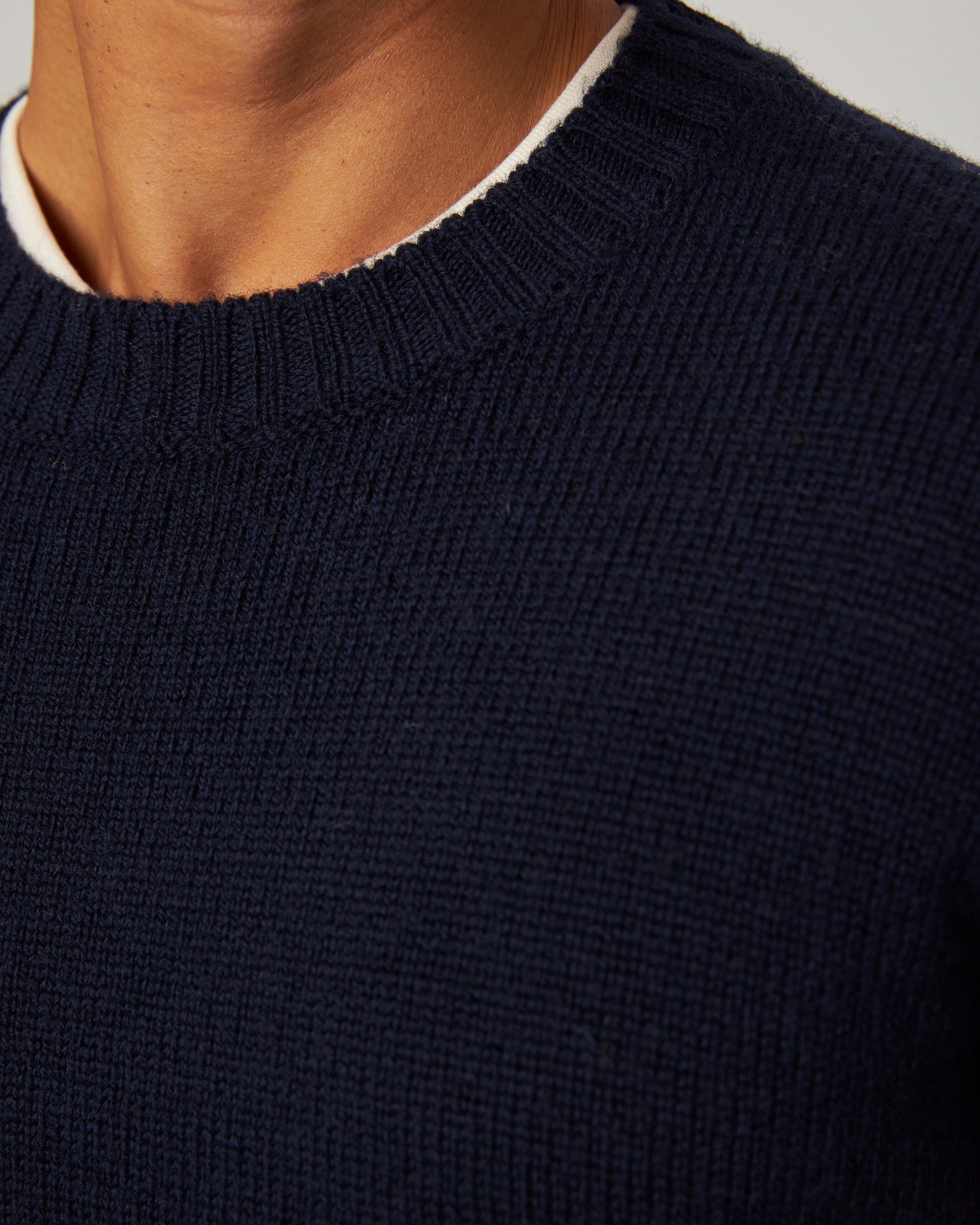 Image of model wearing Makers Stitch Jumper. Model is 6ft1in, chest size 38in and wearing size Medium