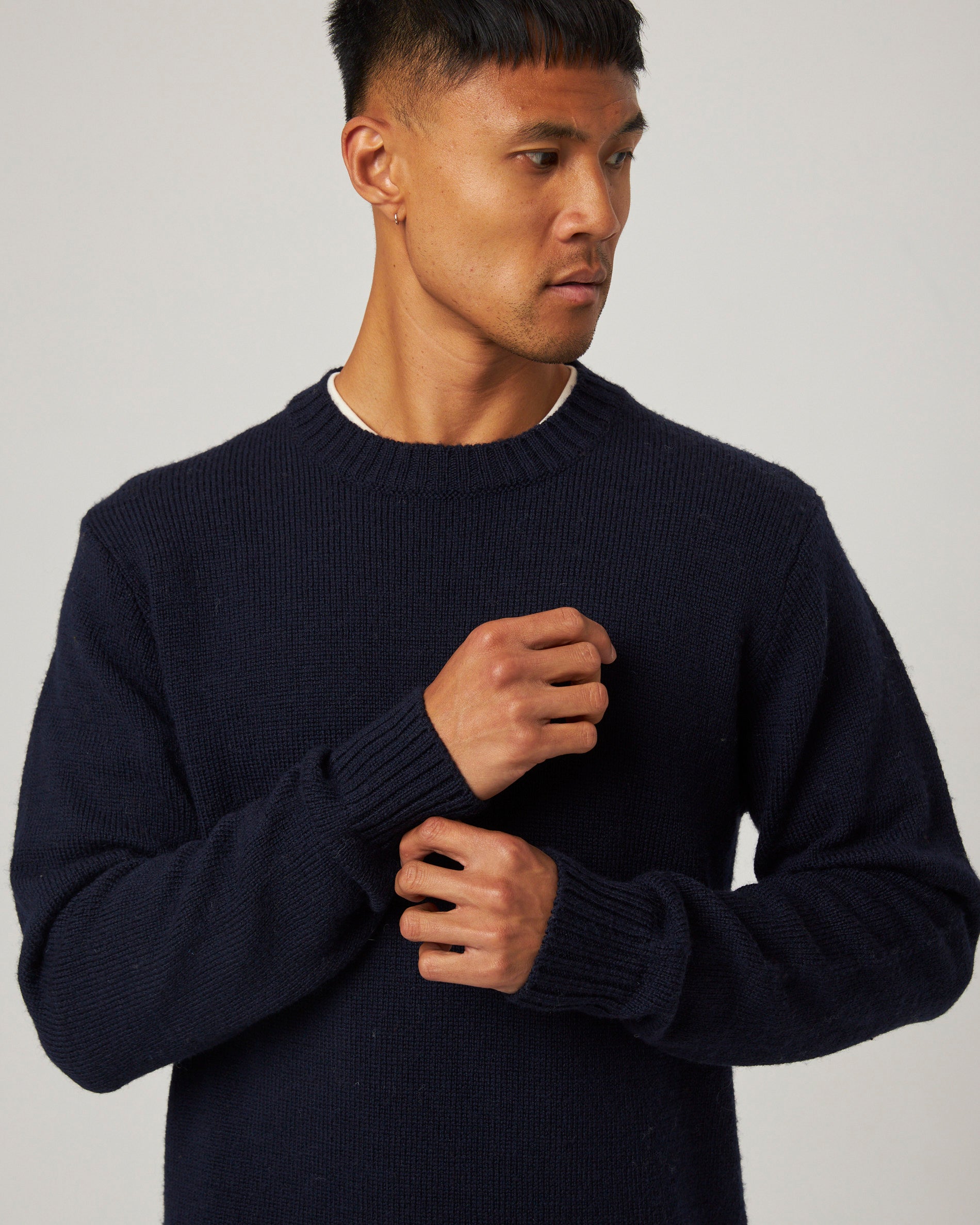 Image of model wearing Makers Stitch Jumper. Model is 6ft1in, chest size 38in and wearing size Medium