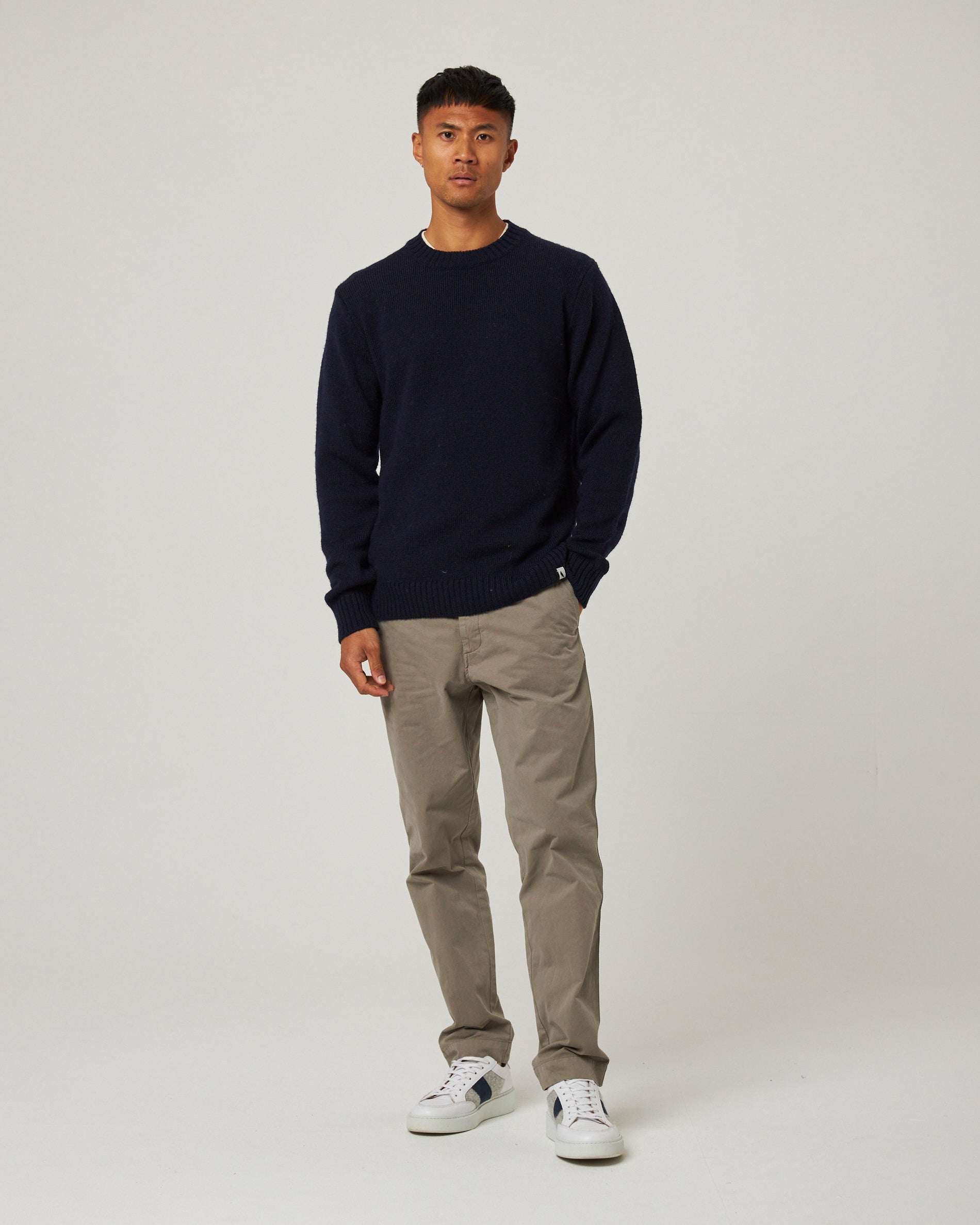 Image of model wearing Makers Stitch Jumper. Model is 6ft1in, chest size 38in and wearing size Medium