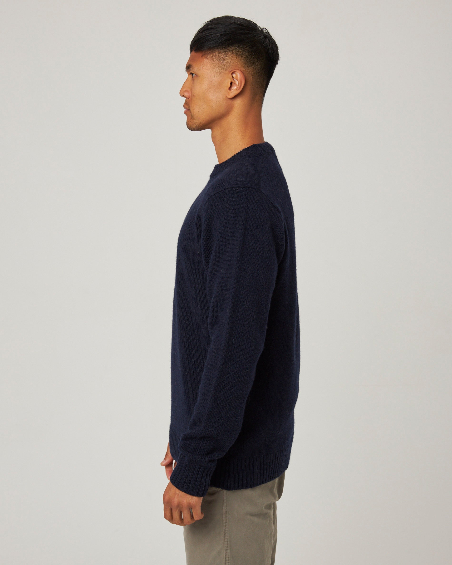 Image of model wearing Makers Stitch Jumper. Model is 6ft1in, chest size 38in and wearing size Medium