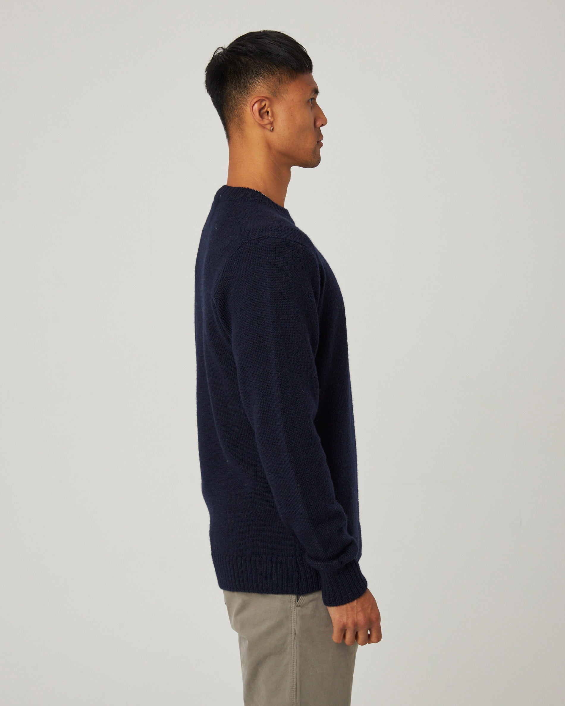 Image of model wearing Makers Stitch Jumper. Model is 6ft1in, chest size 38in and wearing size Medium