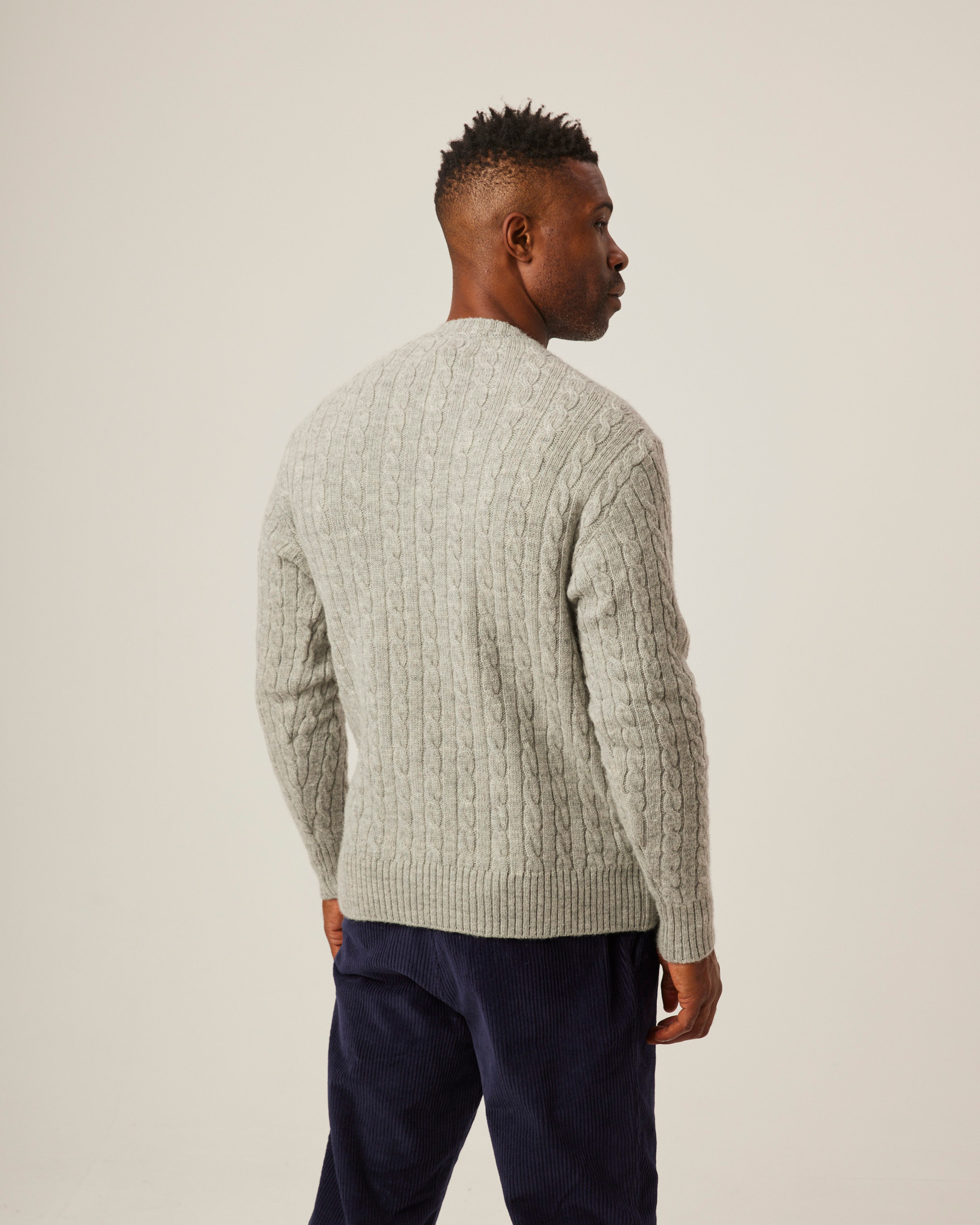 Image of model wearing Makers Stitch Cable Crew Jumper. 