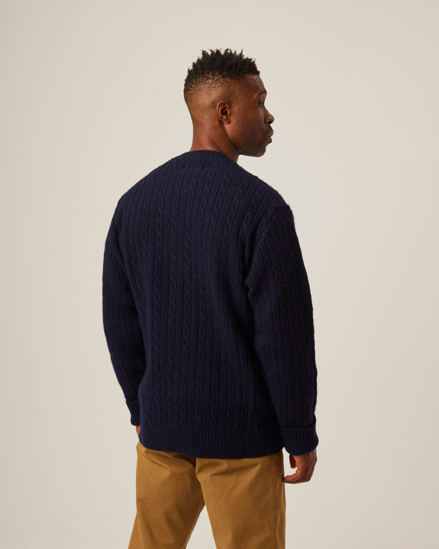 Image of model wearing Makers Stitch Cable Crew Jumper. 