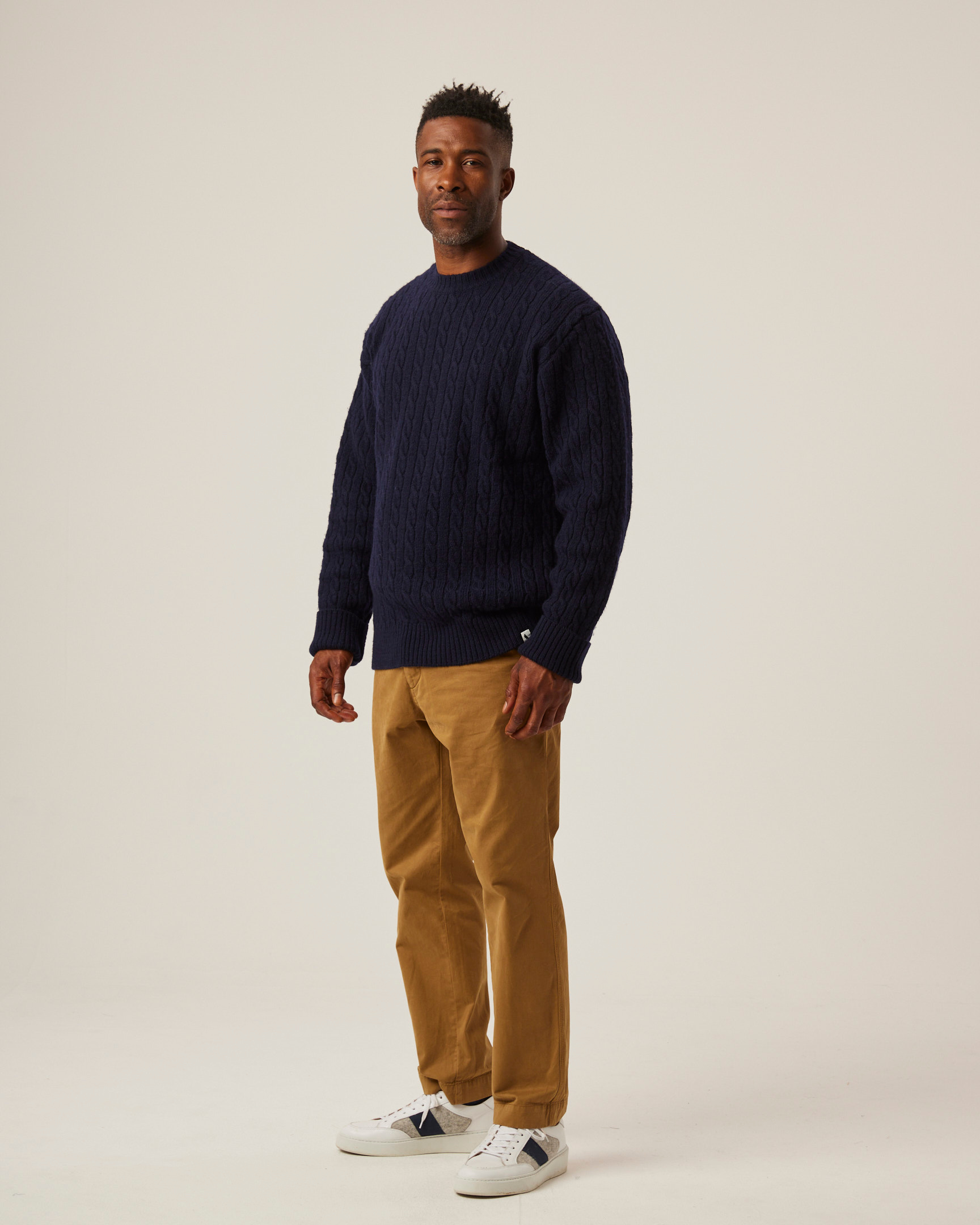 Image of model wearing Makers Stitch Cable Crew Jumper. 