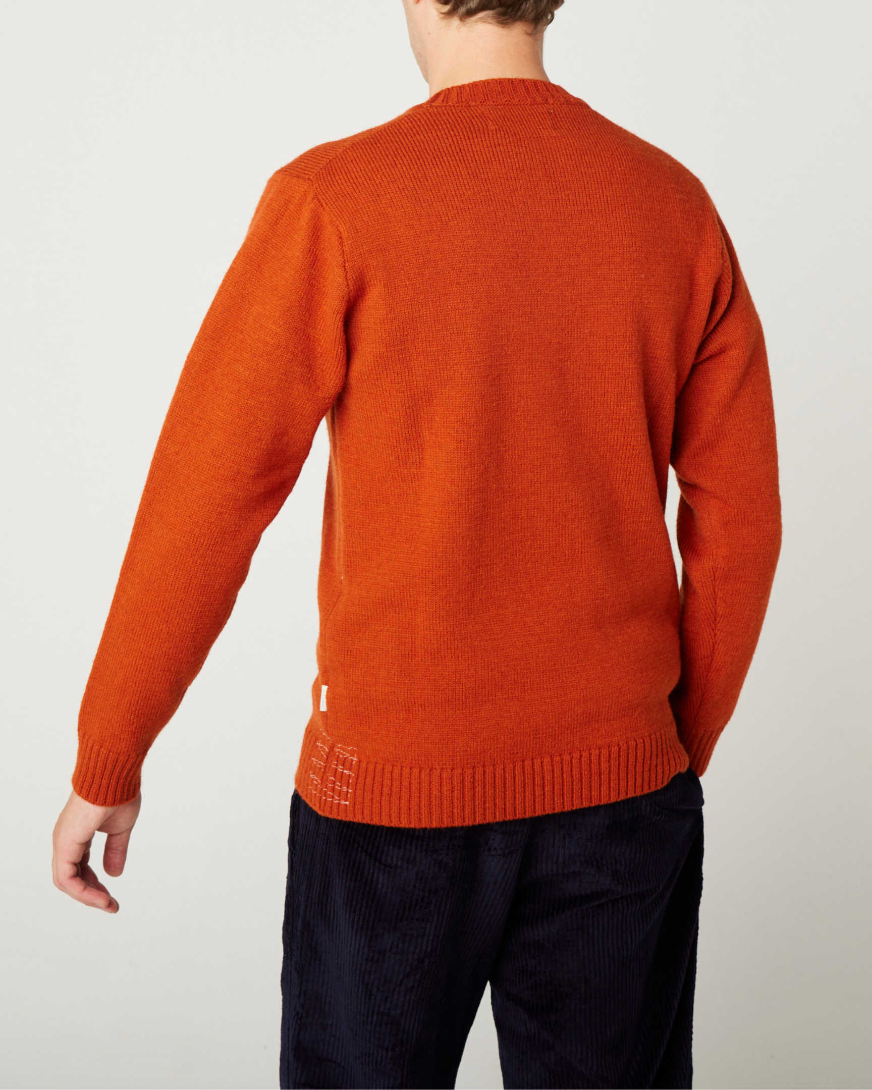 Image of model wearing Makers Stitch Jumper. Model is 6ft1in, chest size 38in and wearing size Large
