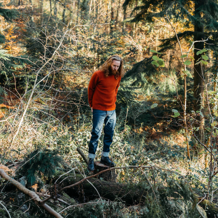 Image of model wearing Makers Stitch Jumper. Model is 6ft1in, chest size 38in and wearing size Large