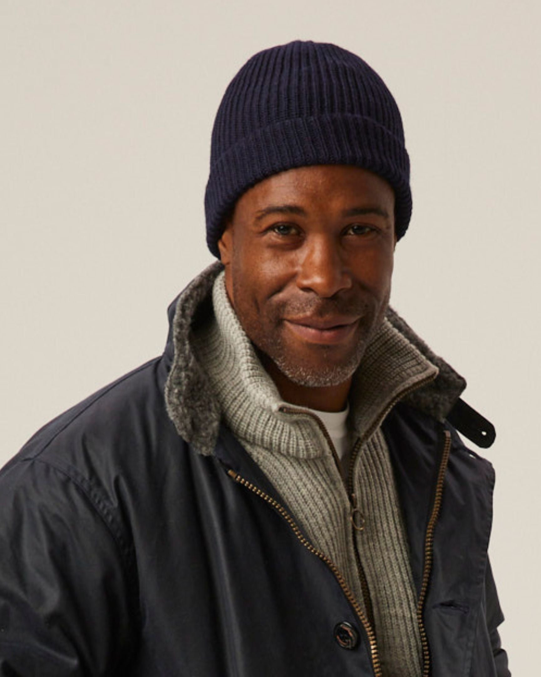 Image of model wearing Porter Ribbed Beanie. One Size 