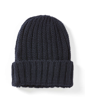 Image of model wearing Milliner Ribbed Beanie. One Size