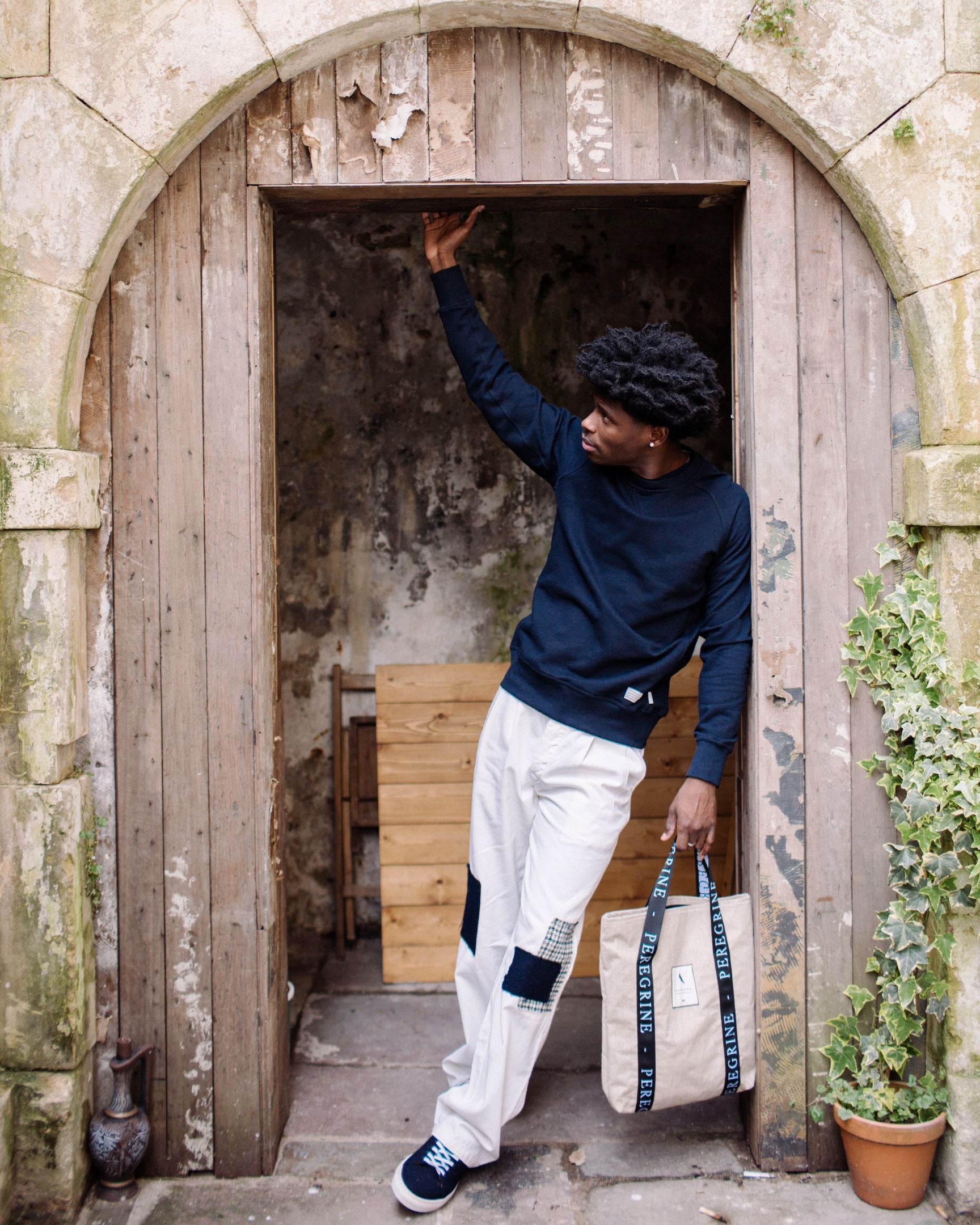 Image of model wearing Recycled Wool Tote Bag. One Size