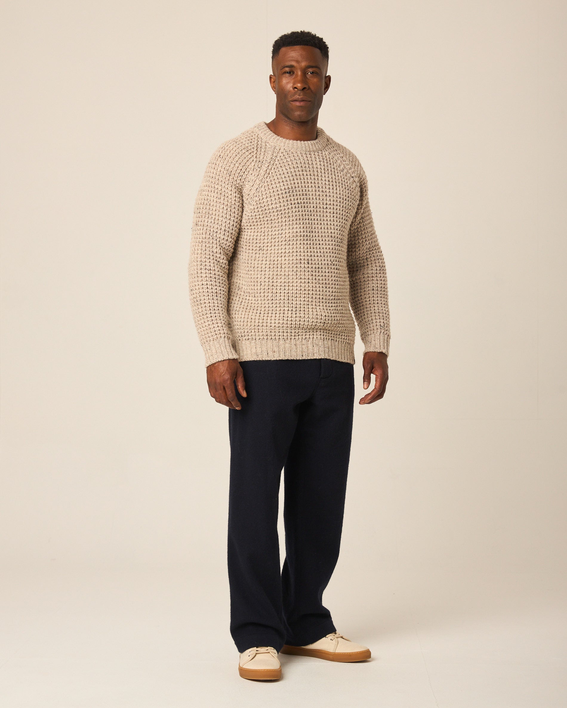 Image of model wearing Waffle Crew Neck Jumper. Model is 6ft1in, chest size 38in and wearing size Medium